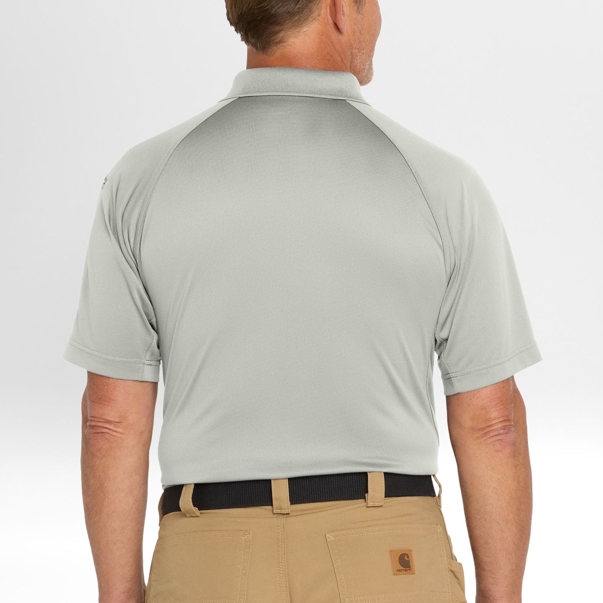 Man wearing a light gray Snag-Proof Tactical Polo shirt and beige pants on a white background