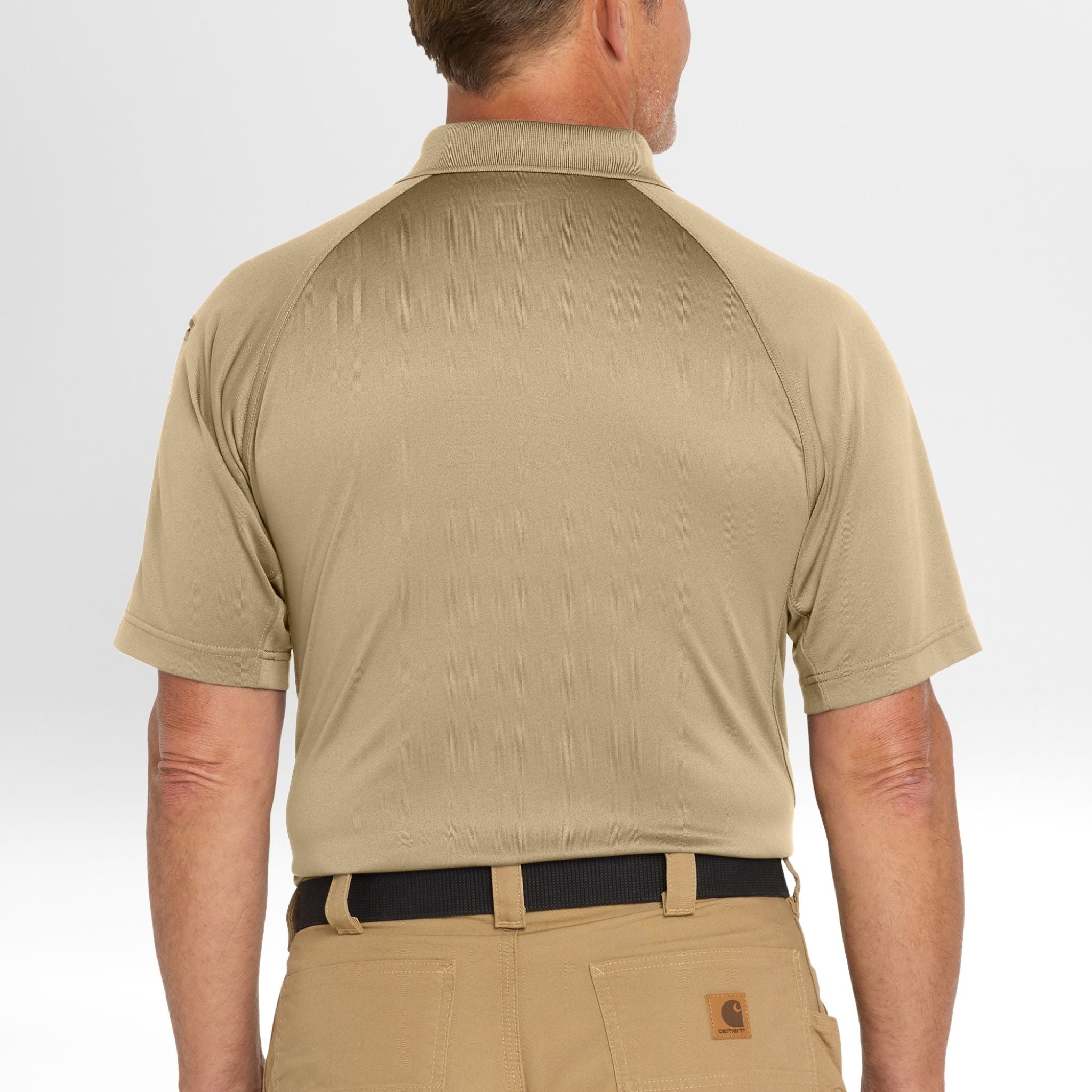 Man wearing a beige Snag-Proof Tactical Polo shirt and pants on a white background