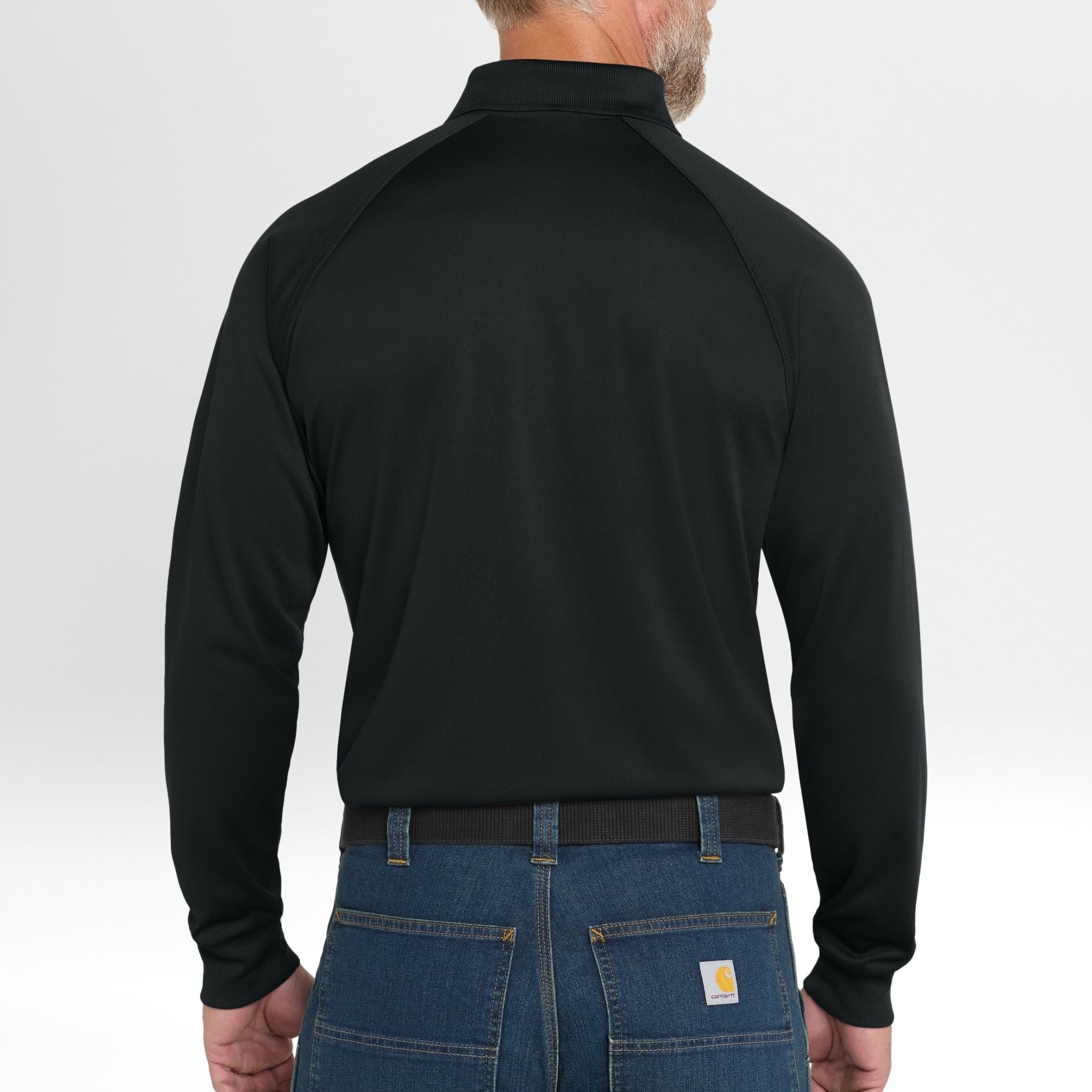 Person wearing a black long-sleeve Snag-Proof Tactical Polo shirt and blue jeans on a white background