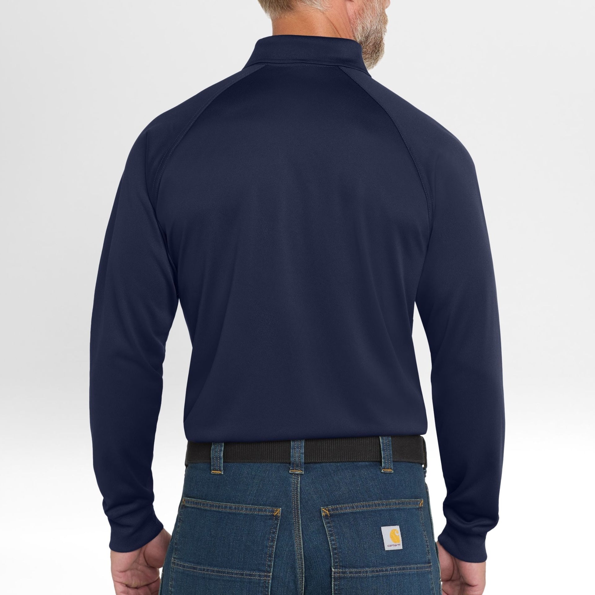Person wearing a navy long-sleeve Snag-Proof Tactical Polo shirt with a visible brand logo on a white background
