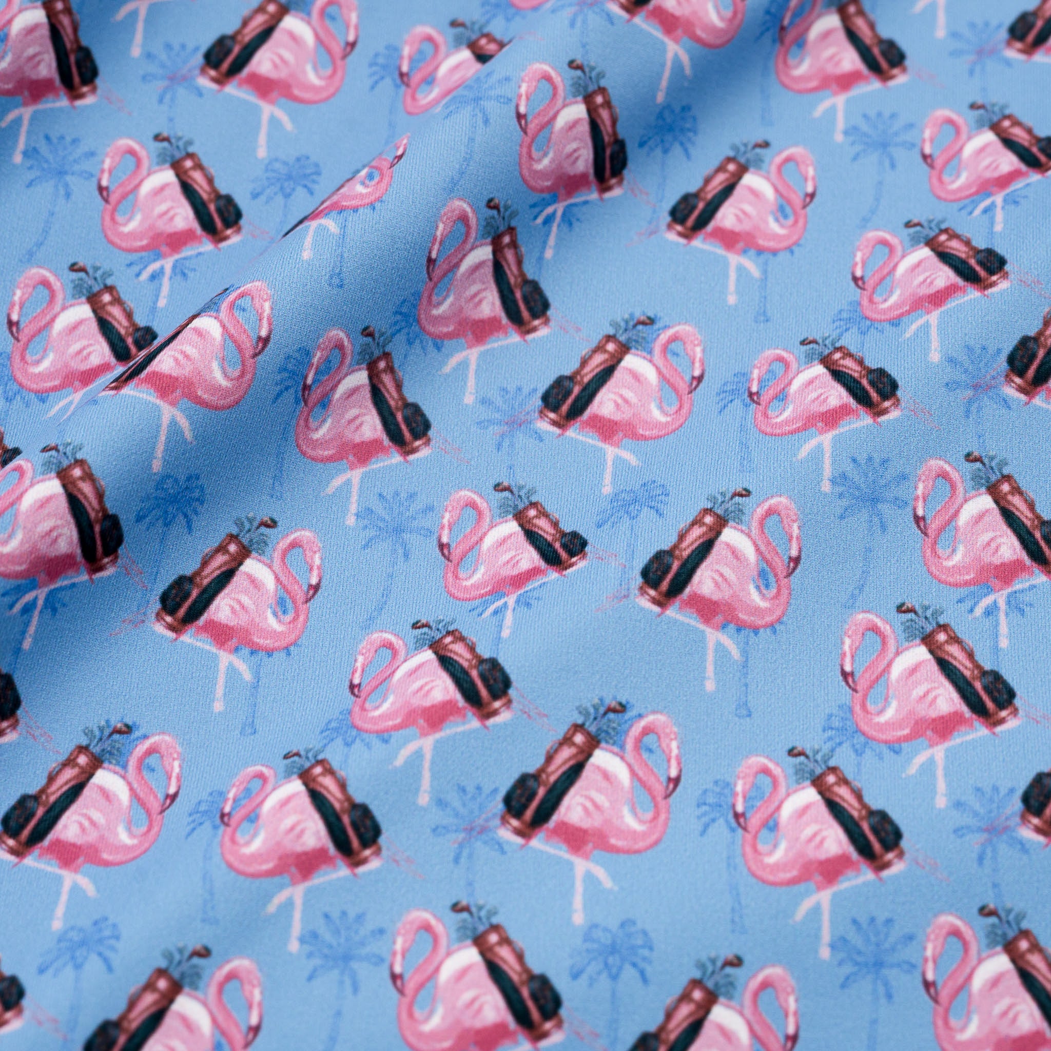 Pattern of pink flamingos with golf bag