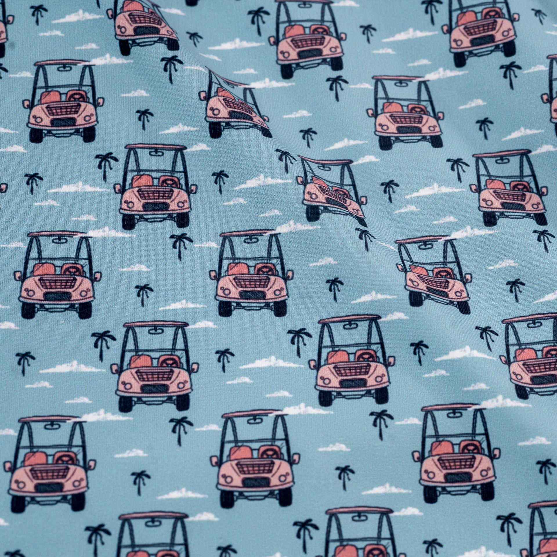 Pattern of pink golf carts and palm trees on a blue background