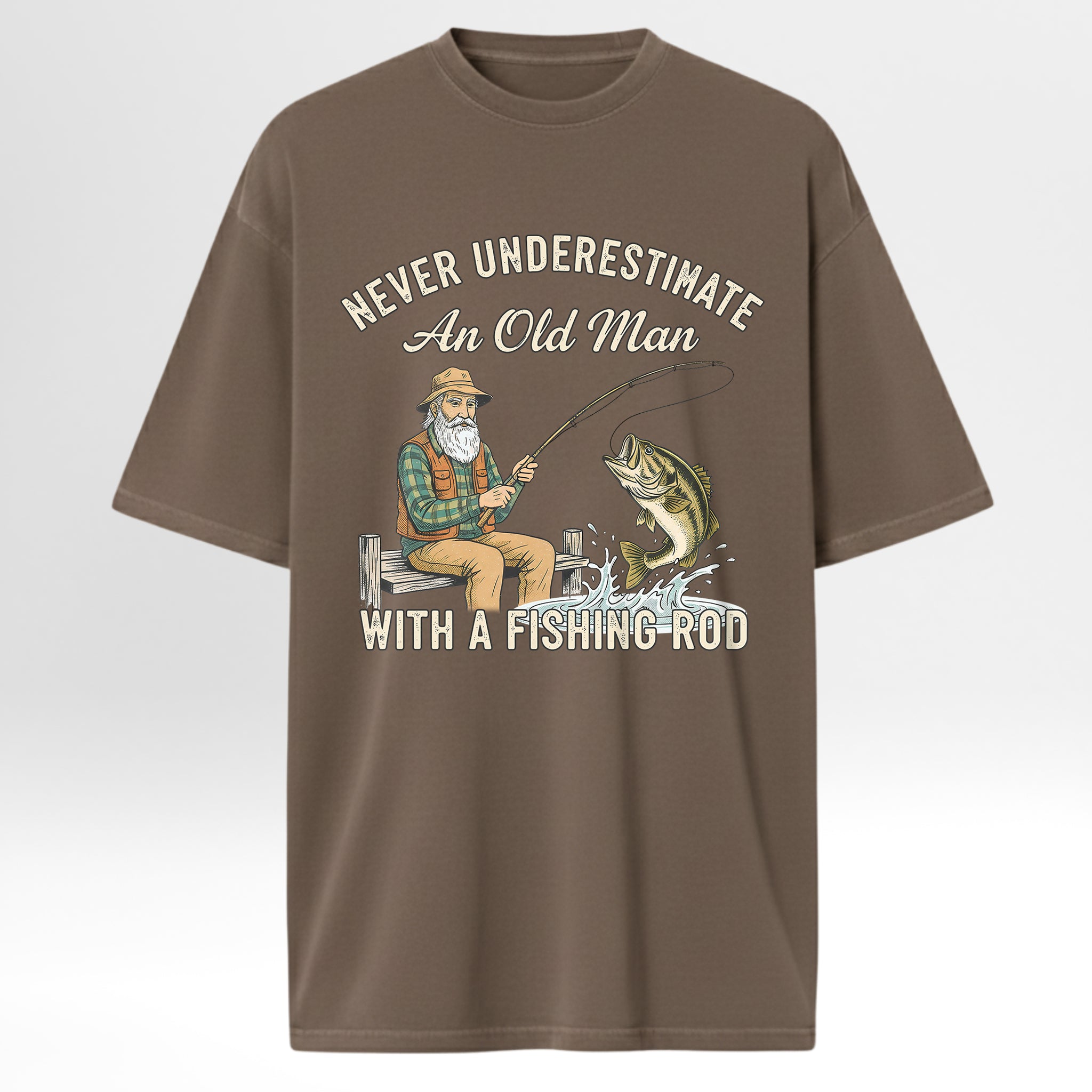 Brown fishing t-shirt with fishing graphic and text 'Never Underestimate An Old Man With A Fishing Rod'.
