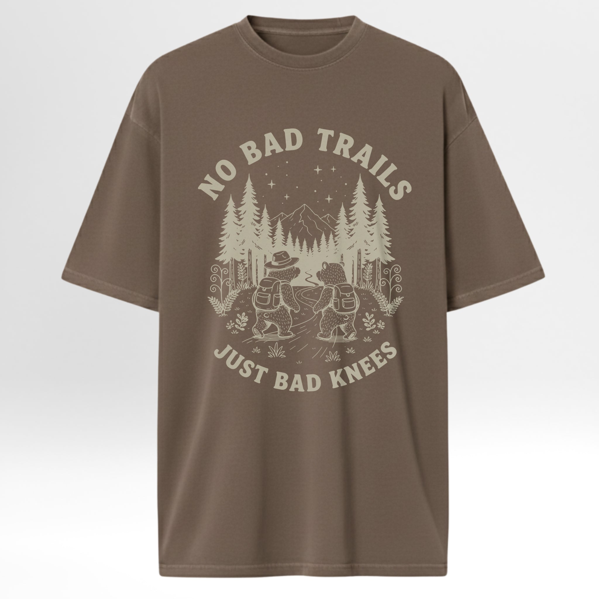 Brown camp & trail t-shirt with a graphic design and text 'No Bad Trails Just Bad Knees'.