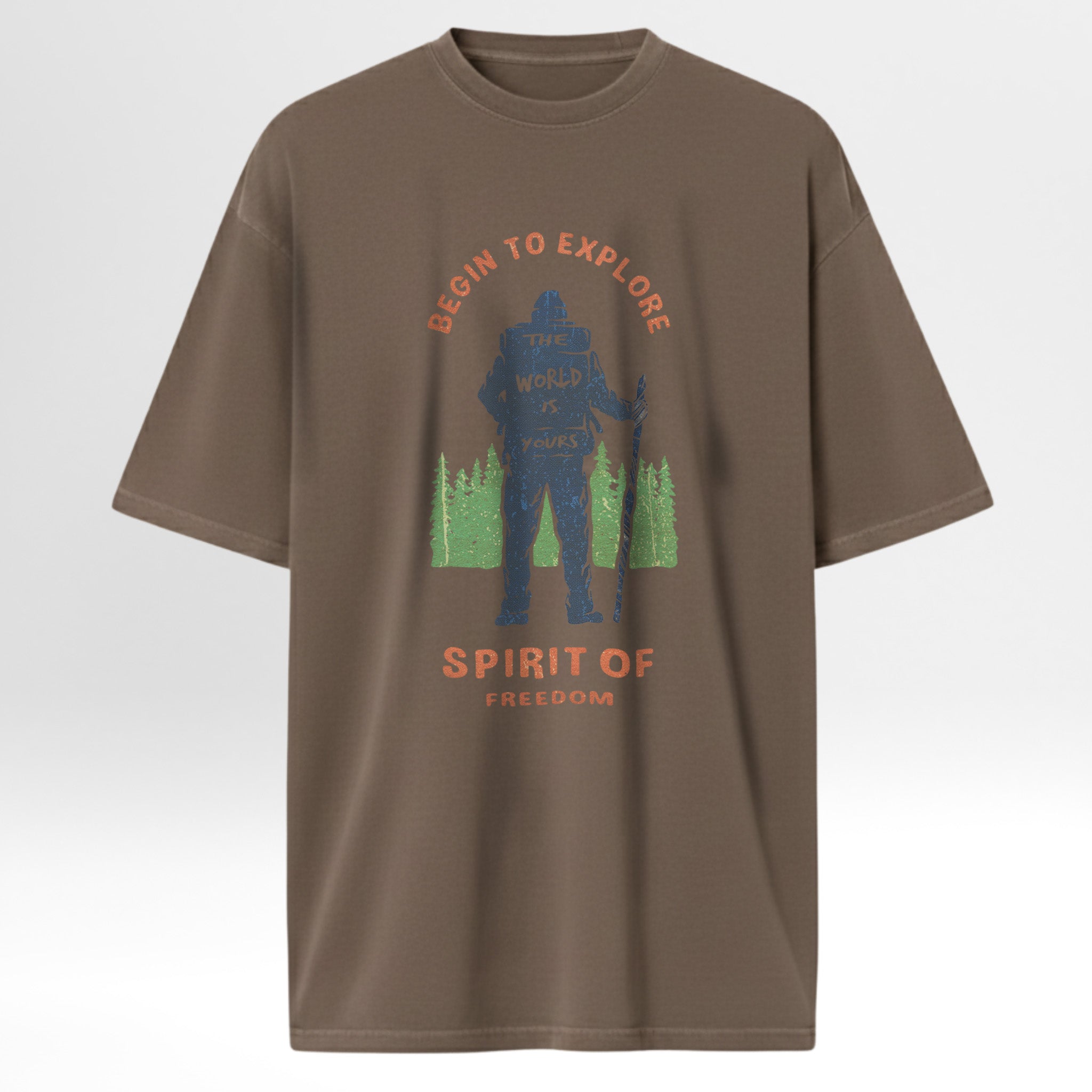 Brown t-shirt with graphic design featuring a silhouette and text 'Begin To Explore The World Is Yours Spirit Of Freedom'