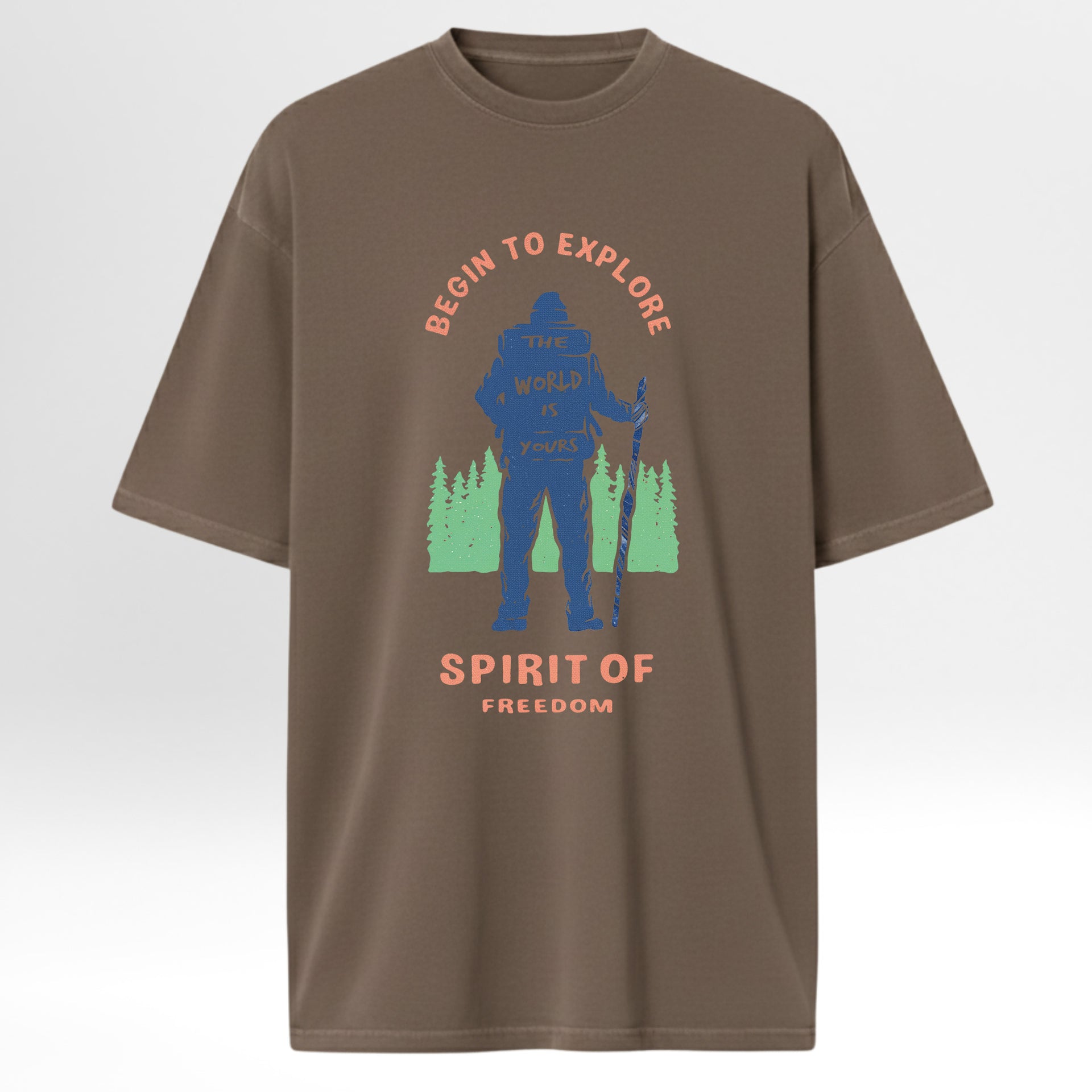 Brown t-shirt with a graphic of a person hiking and text 'Begin to Explore the World is Yours Spirit of Freedom' 
