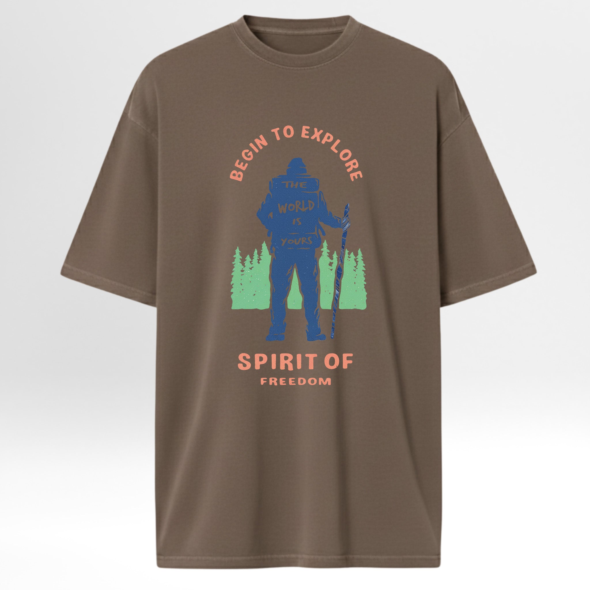 Brown t-shirt with a graphic of a person hiking and text 'Begin to Explore the World is Yours Spirit of Freedom' 