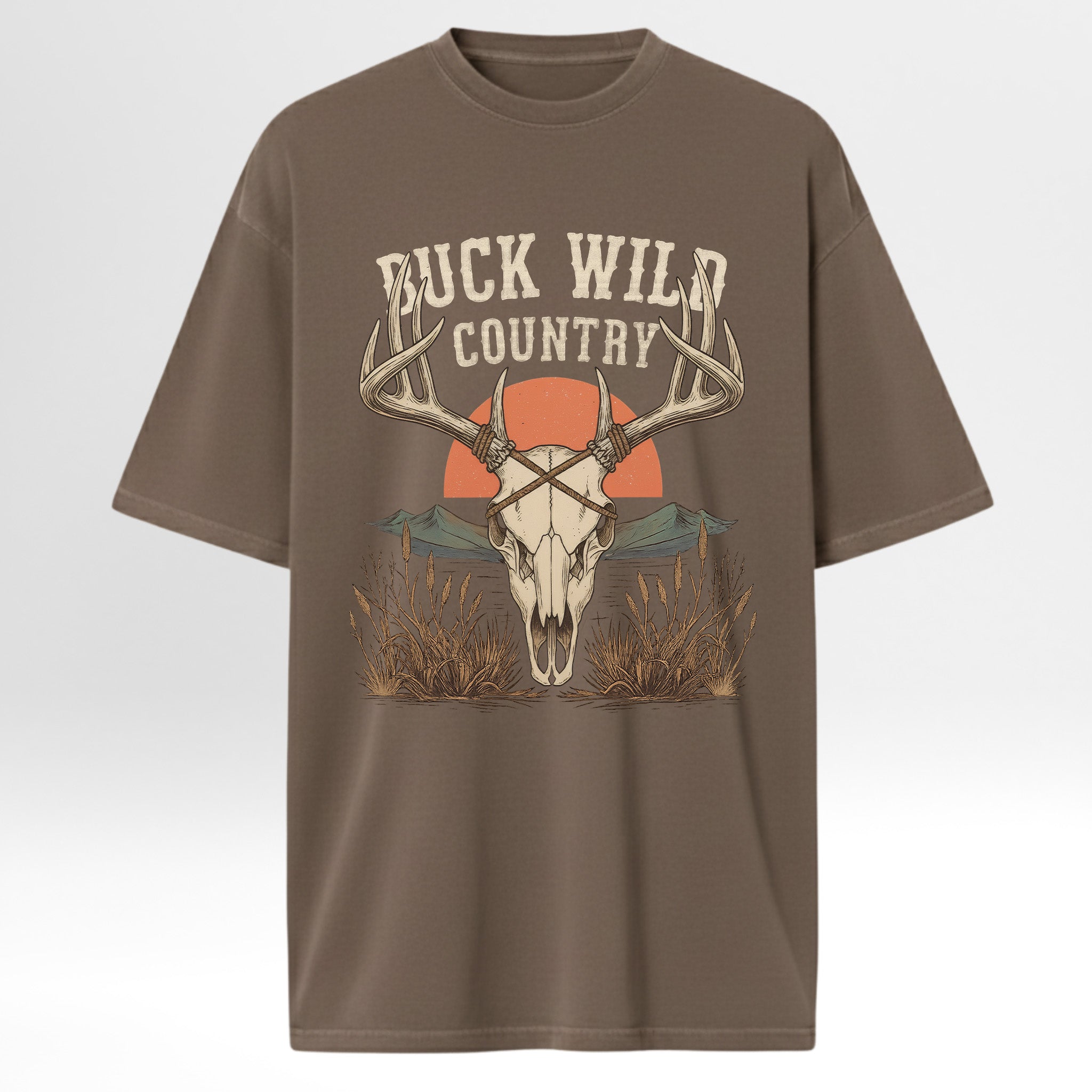 Brown hunting graphic t-shirt with a graphic design of a deer skull and 'Buck Wild Country' text on a white background