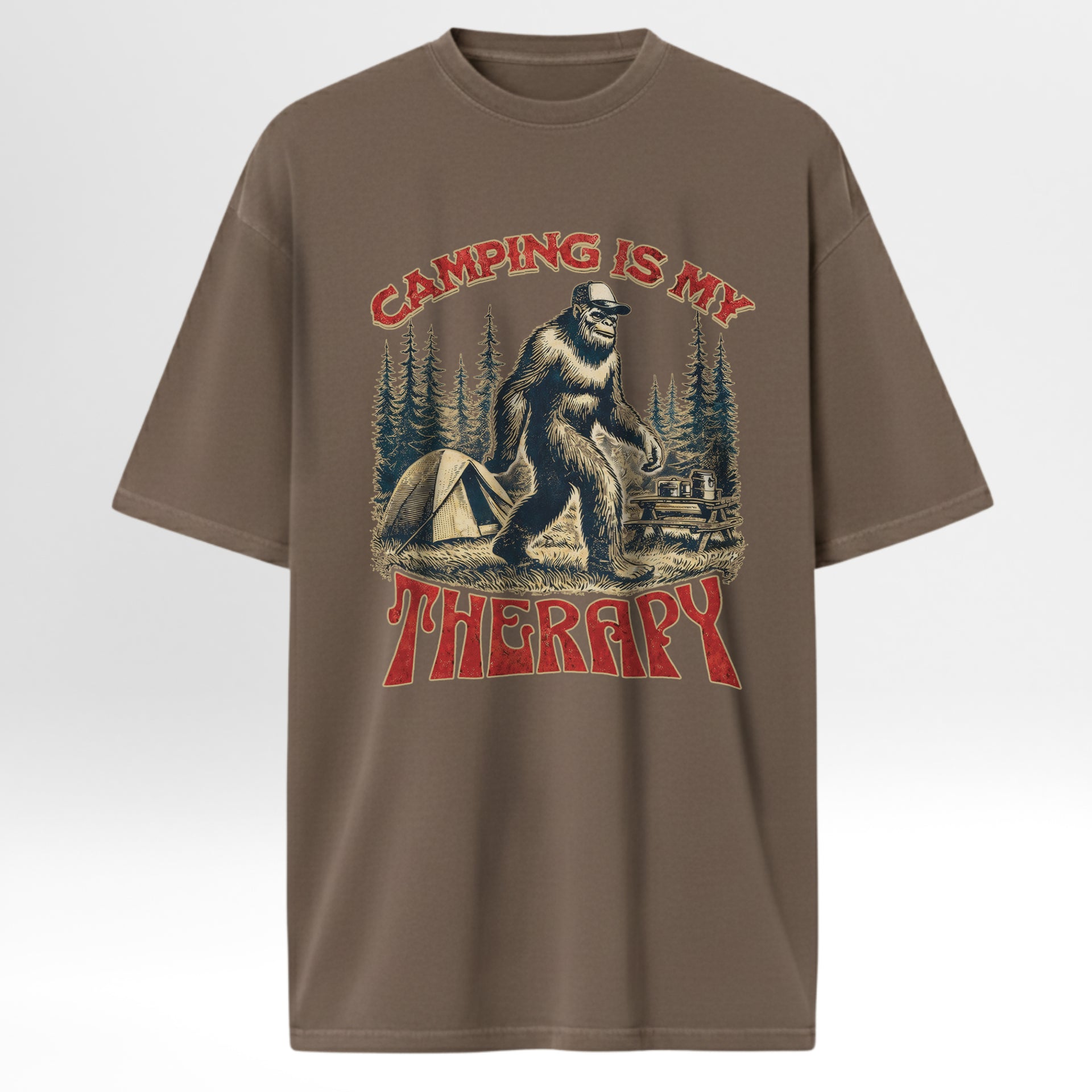 Brown camping t-shirt with 'Camping is my Therapy' graphic featuring a bear and camping scene on a white background.