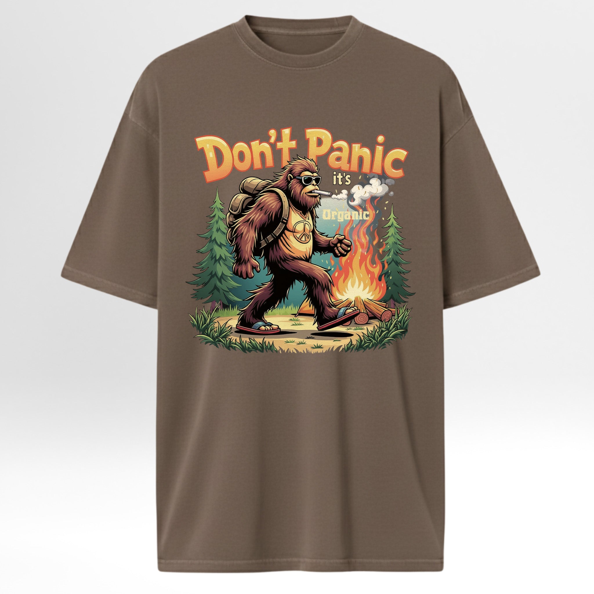 Brown t-shirt with a graphic of a Ape by a campfire and 'Don't Panic it's organic' text 