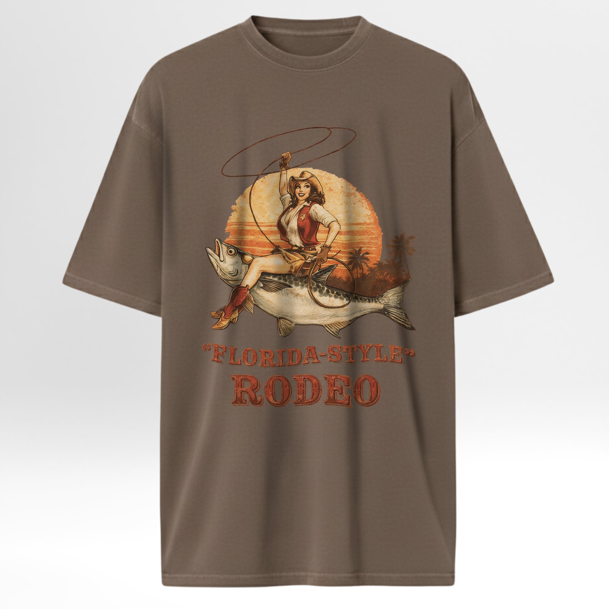 Brown fishing t-shirt with a graphic design of a woman in a cowboy hat and boots, a fish, and 'Florida Style Rodeo' text.