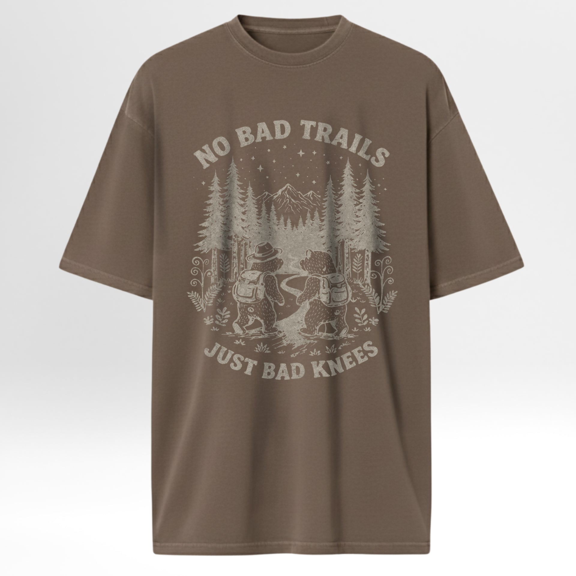 Brown t-shirt with graphic design and text 'No Bad Trails Just Bad Knees' 