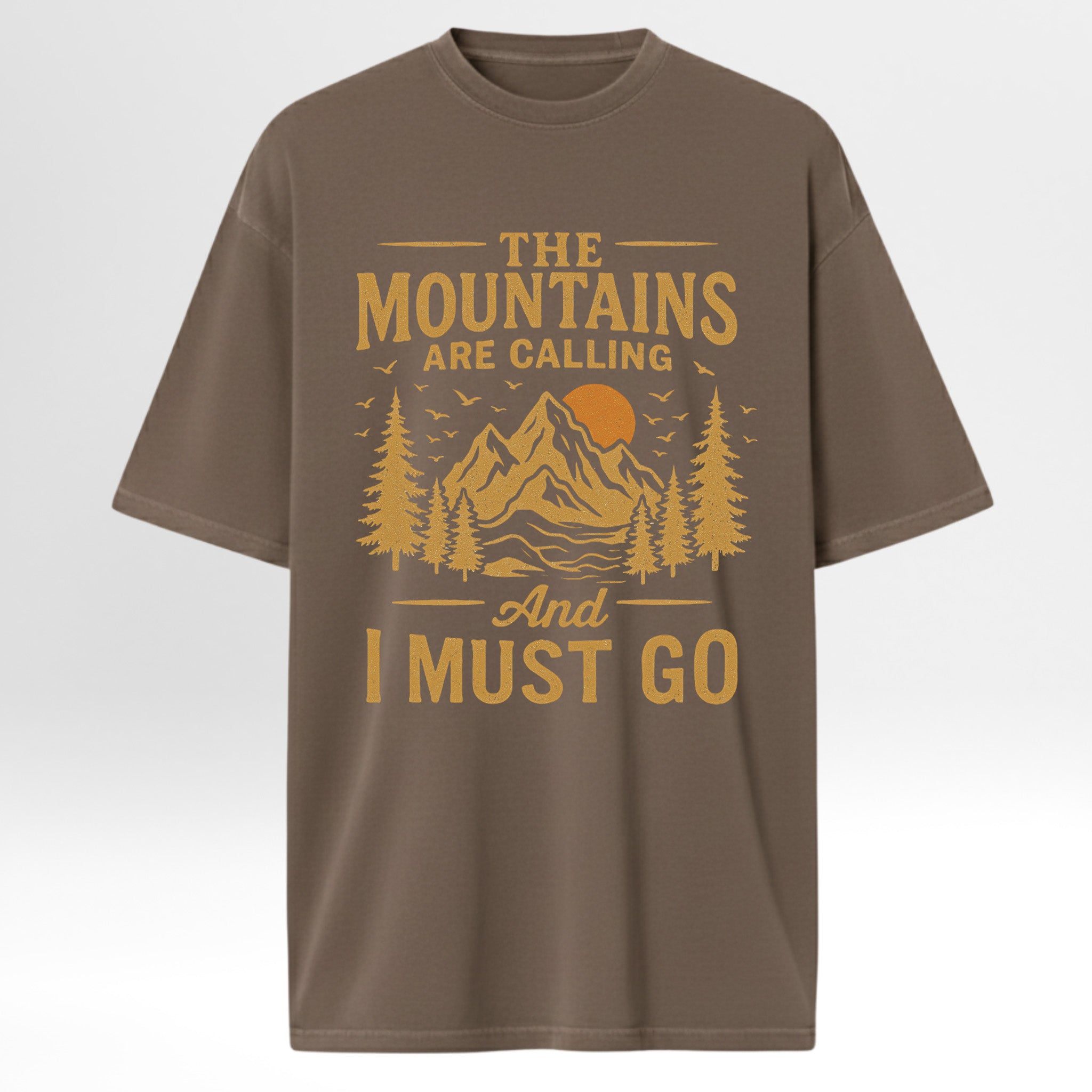 Brown t-shirt with yellow graphic and text 'The Mountains Are Calling And I Must Go' 