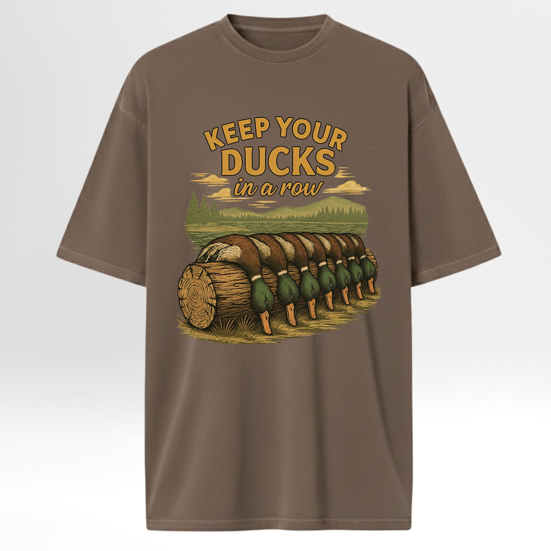 Brown hunting t-shirt with duck graphic and text 'Keep your ducks in a row' 