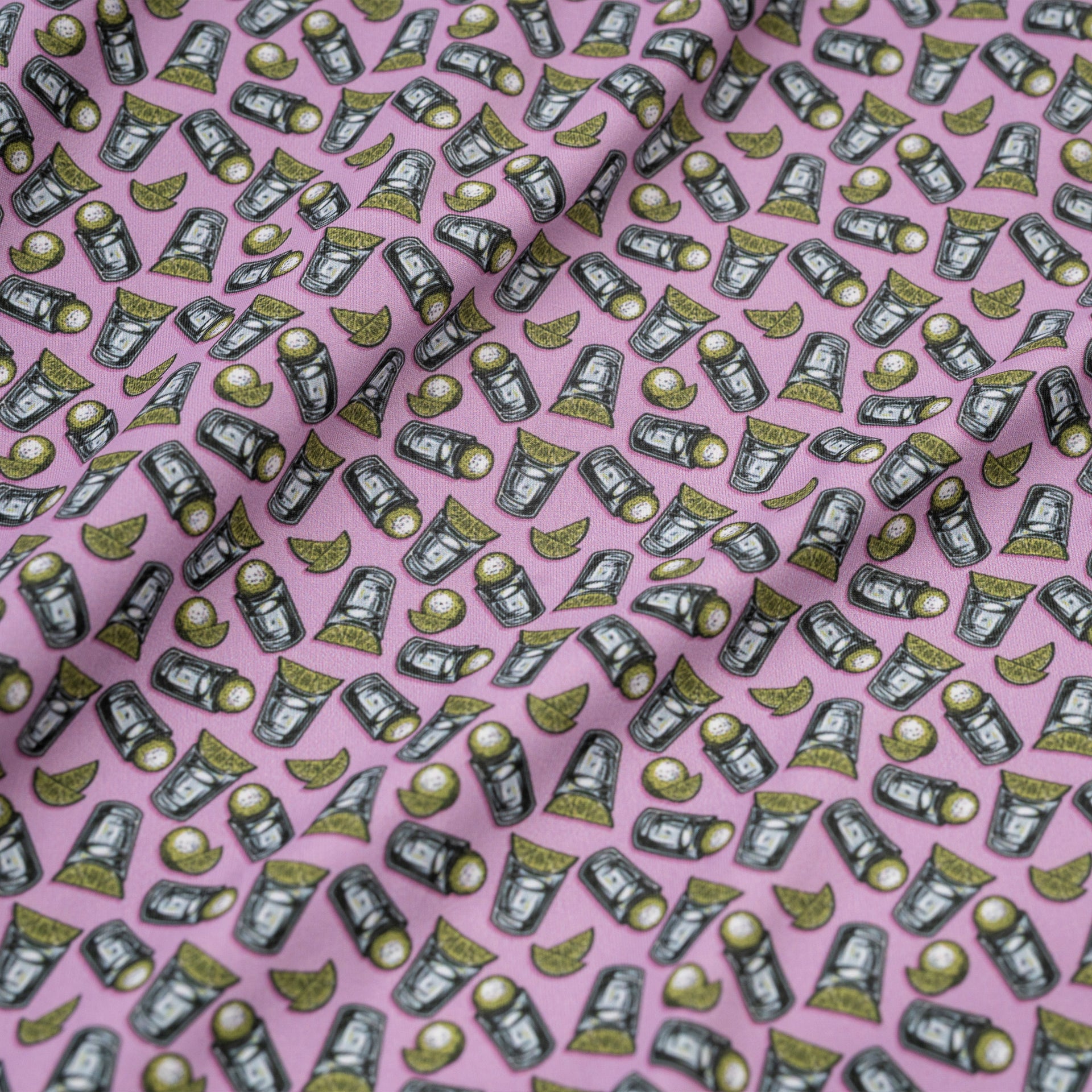 Pattern of tequila shots and limes on a pink background