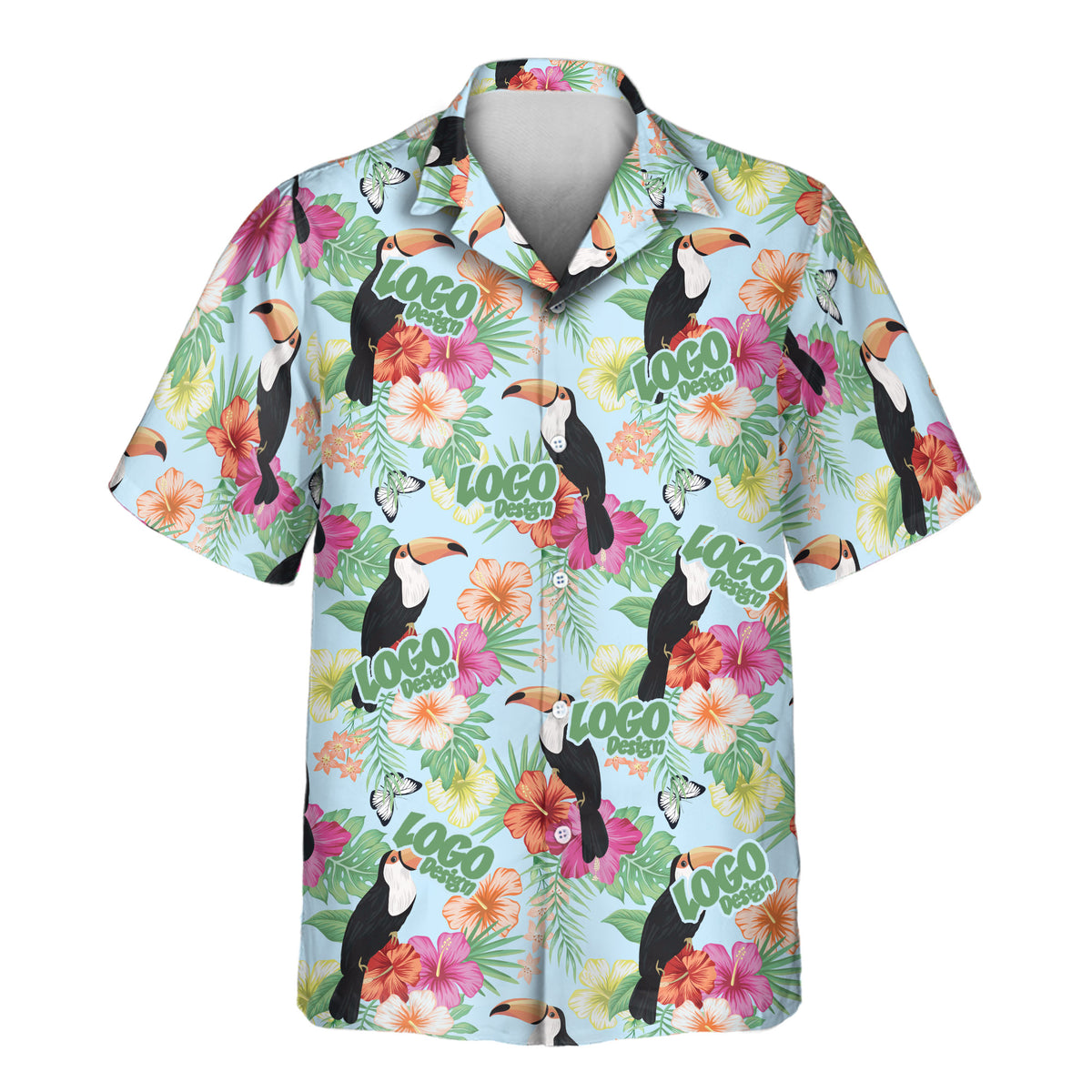 A short-sleeve button-up camp shirt with a vibrant tropical print featuring toucans, hibiscus flowers, butterflies, and palm leaves on a light blue background. The shirt is decorated with repeating green 'LOGO DESIGN' text overlays.