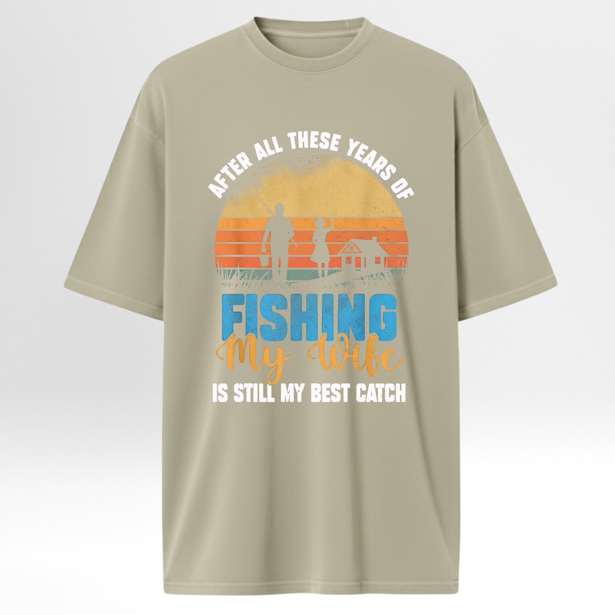 Beige fishing t-shirt with fishing-themed graphic and text 'After All These Years Of Fishing My Wife Is Still My Best Catch'.