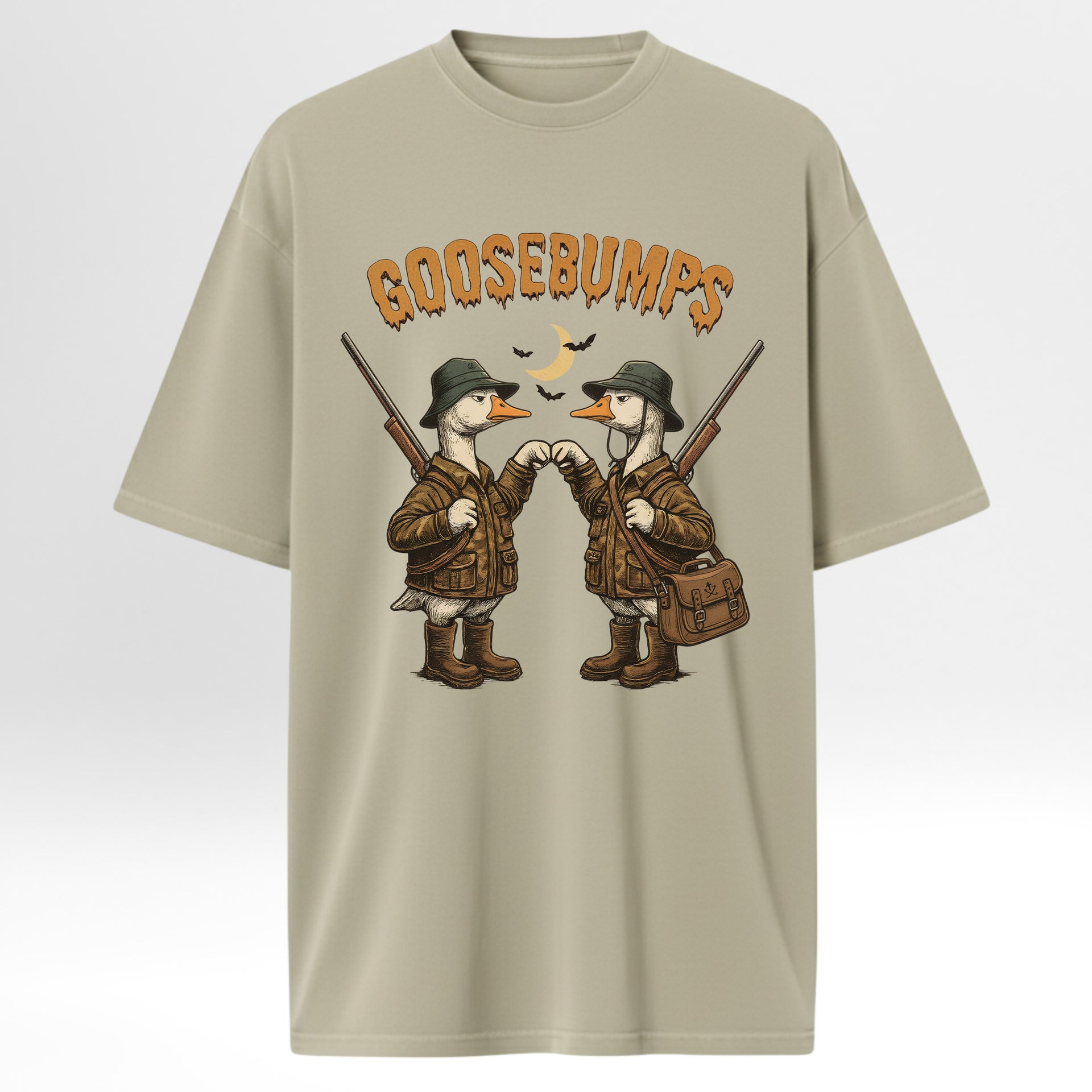 Beige hunting graphic t-shirt with cartoon ducks holding guns and 'GOOSEBUMPS' text on a white background