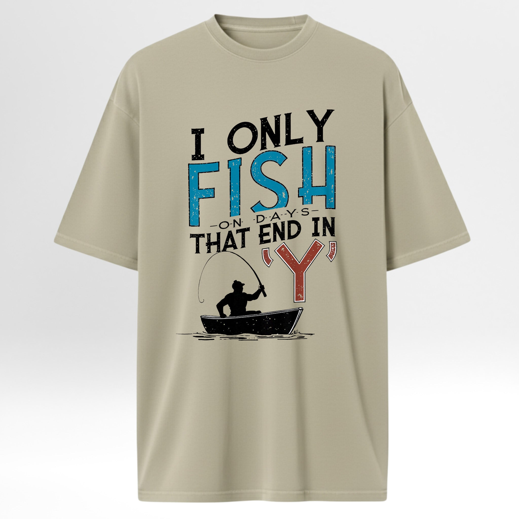 Beige fishing t-shirt with fishing graphic and text 'I Only Fish On Days That End In 'Y''.