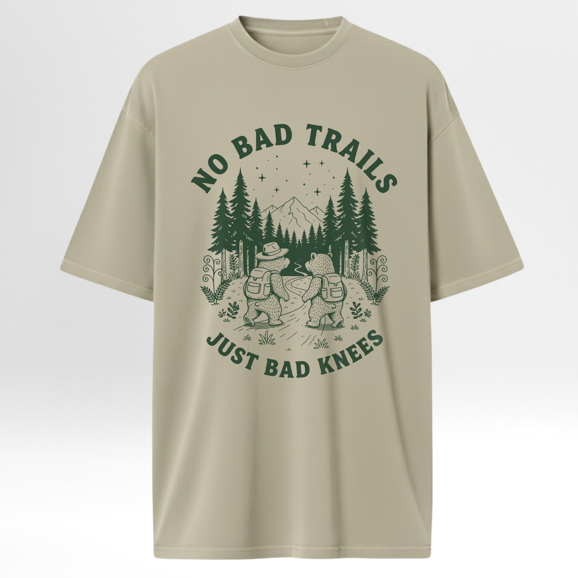 Beige camp & trail t-shirt with green graphic and text 'No Bad Trails Just Bad Knees'.