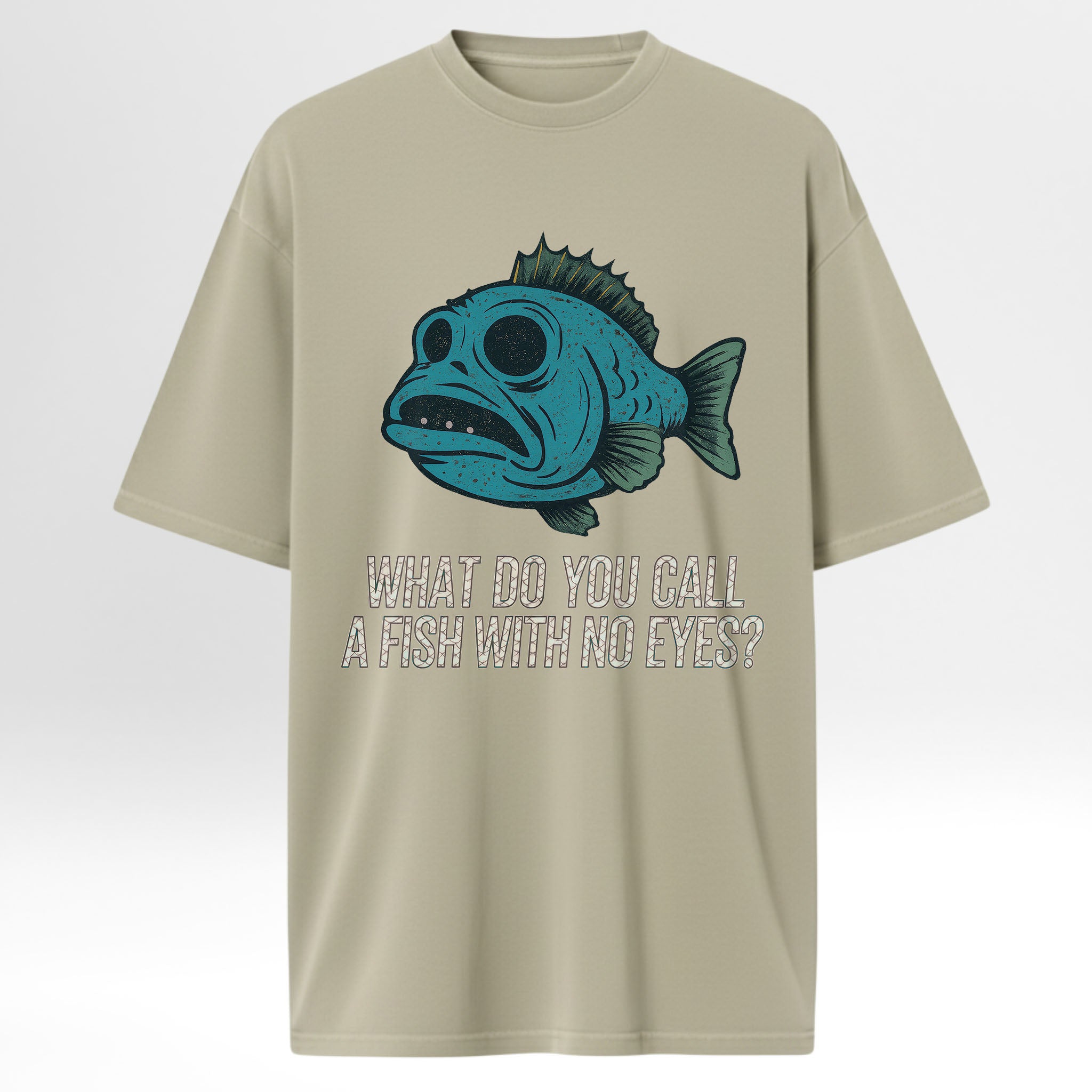 Beige fishing t-shirt with a blue fish graphic and text 'What Do You Call A Fish With No Eyes'.