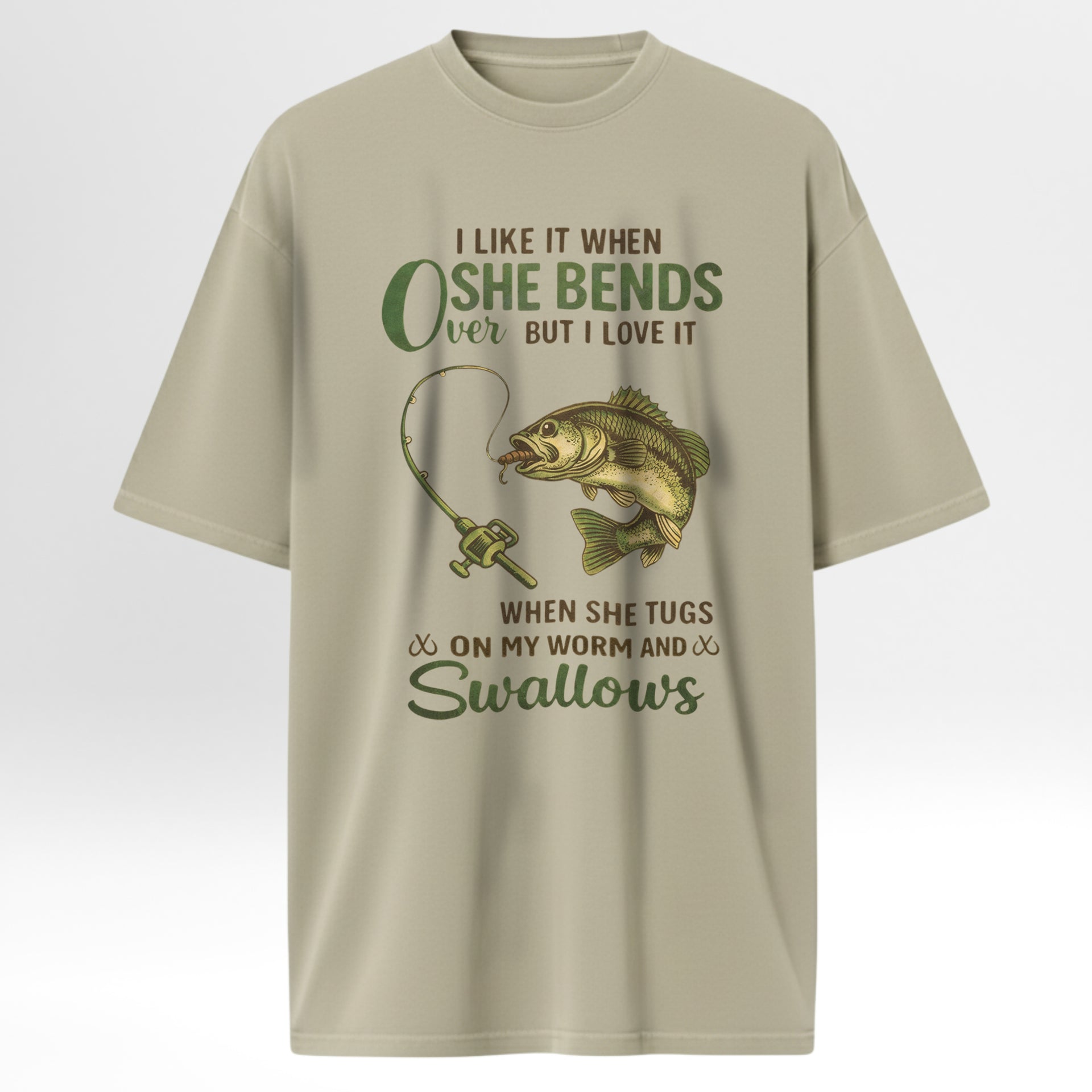Beige fishing t-shirt with fishing graphic and humorous text 'I Like It When She Bends Over But I Love It When She Tugs On My Worm And Swallows'