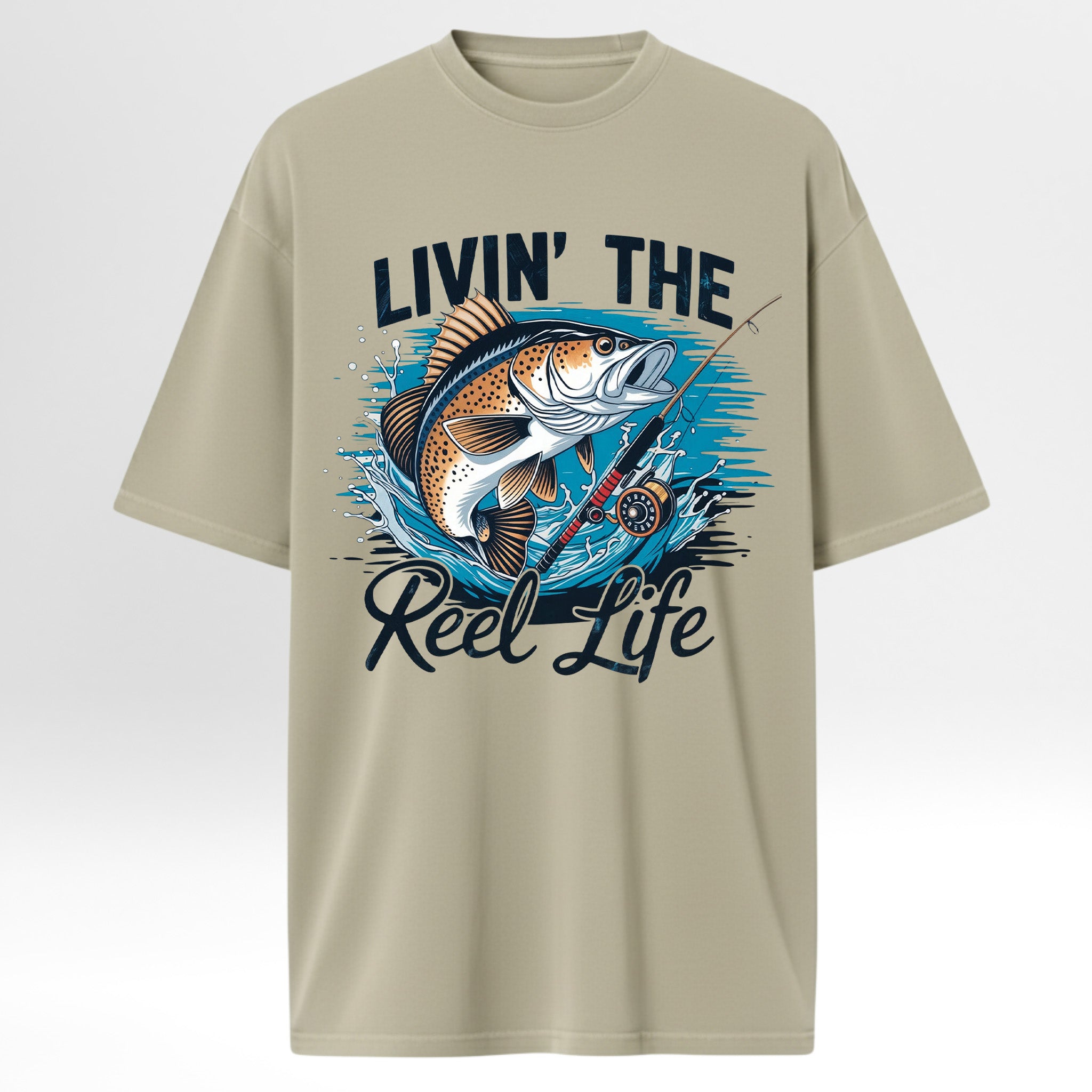 Beige fishing graphic t-shirt with a fish graphic and 'Livin' The Reel Life' text 
