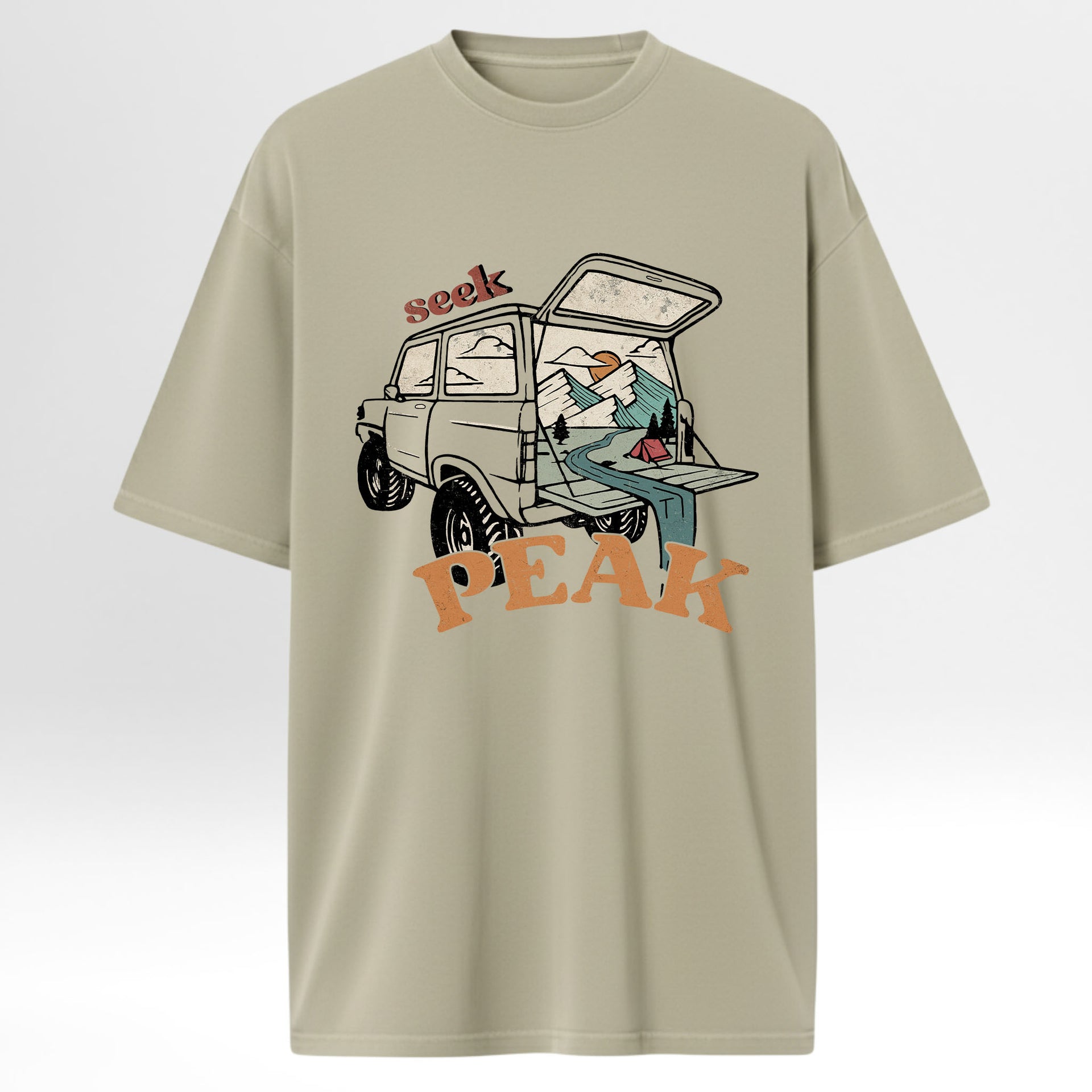 Beige t-shirt with graphic design of a car and text 'Seek Peak'