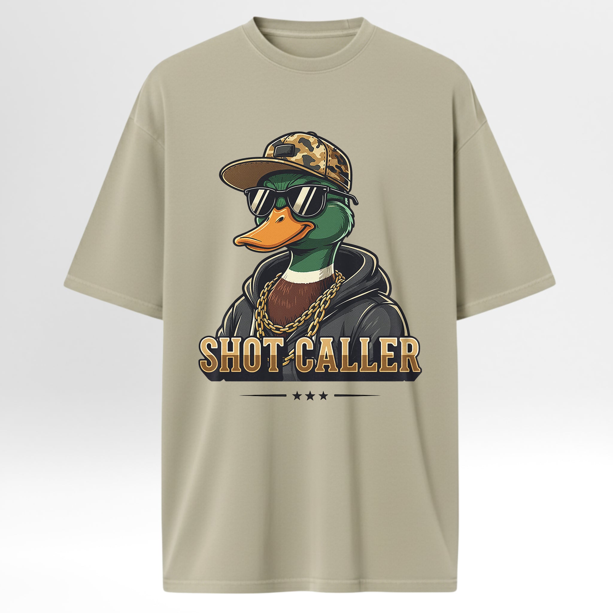 Beige hunting graphic t-shirt with a graphic of a duck wearing sunglasses and a cap, labeled 'Shot Caller'