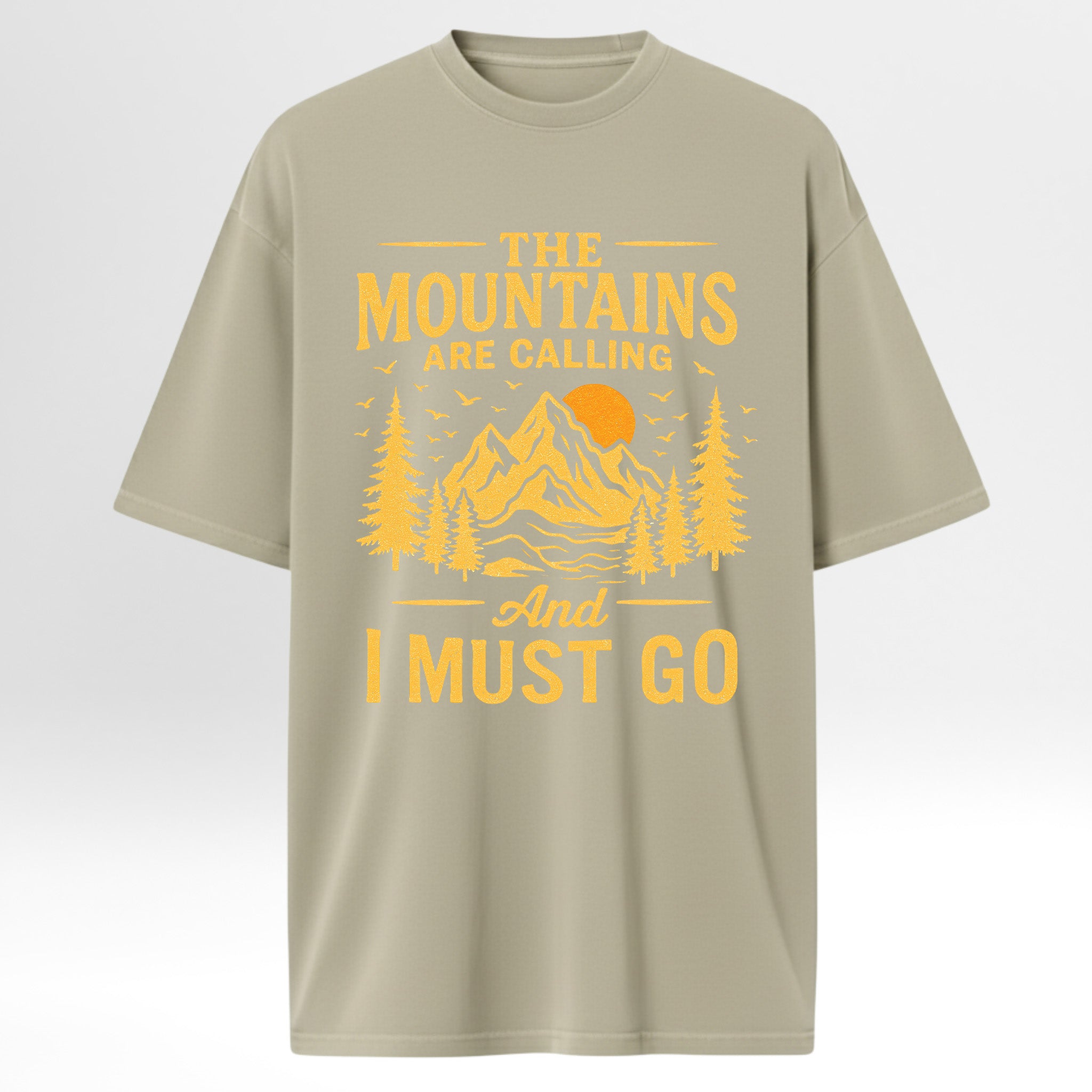 Beige t-shirt with yellow graphic and text 'The Mountains Are Calling And I Must Go' 