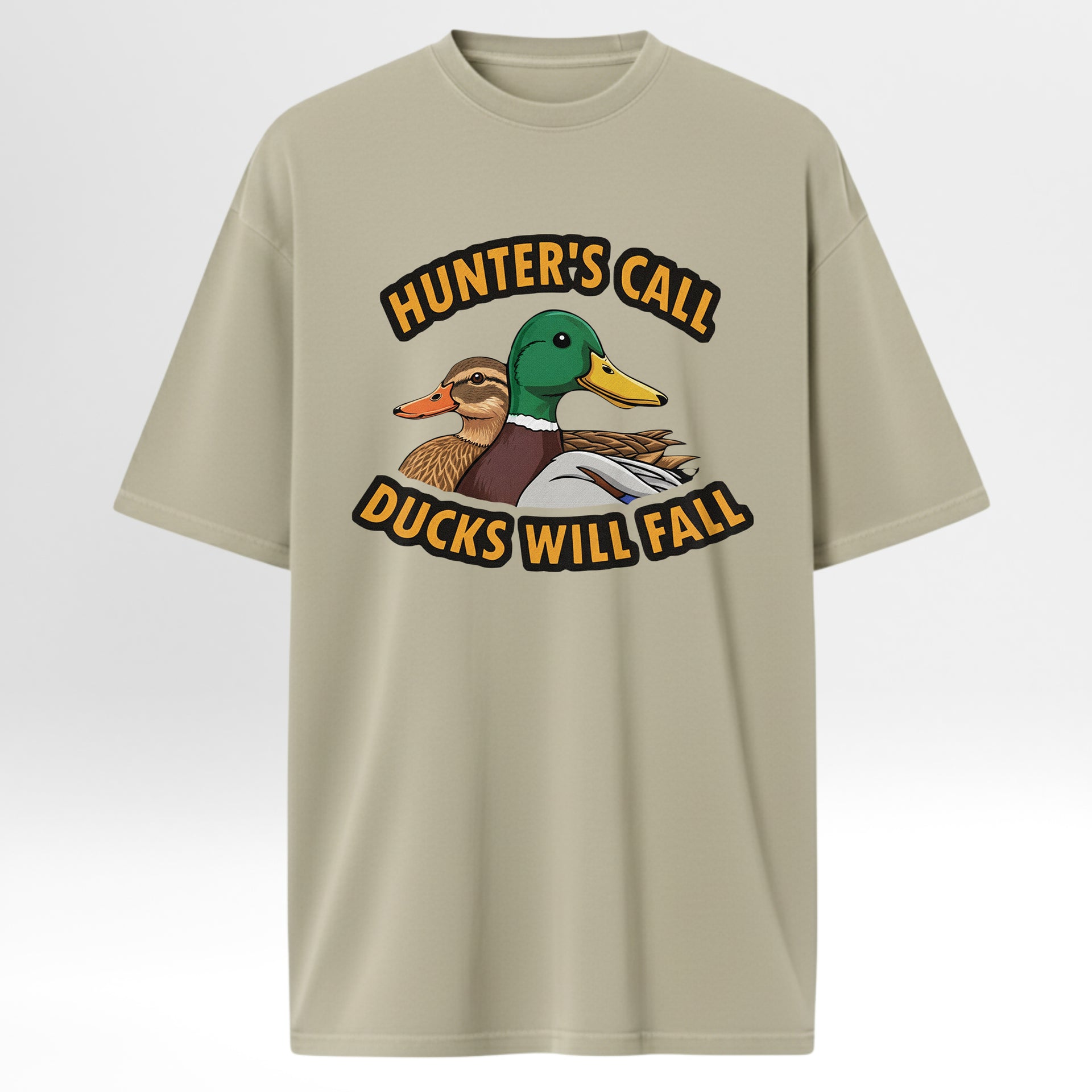 Beige hunting t-shirt with a duck graphic and text 'Hunter's Call Ducks Will Fall'