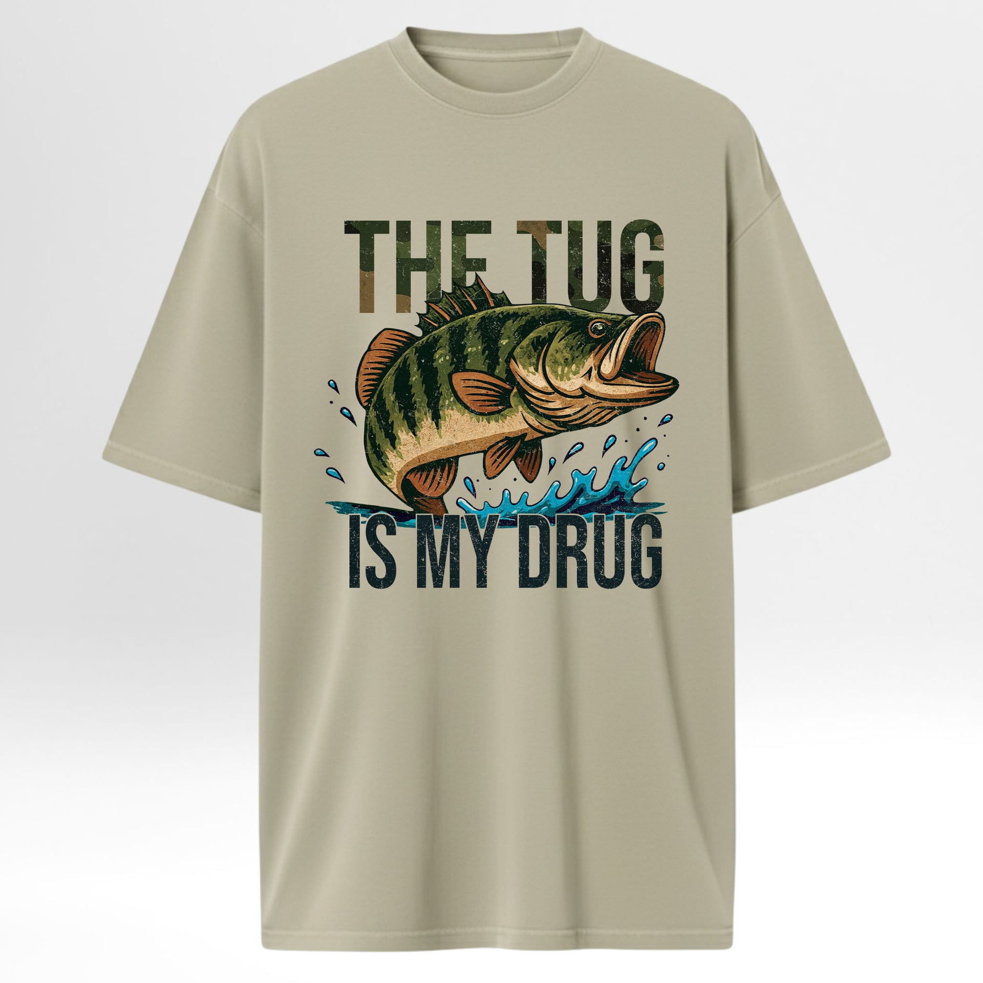 Beige fishing t-shirt with a fish graphic and text 'The Tug Is My Drug'