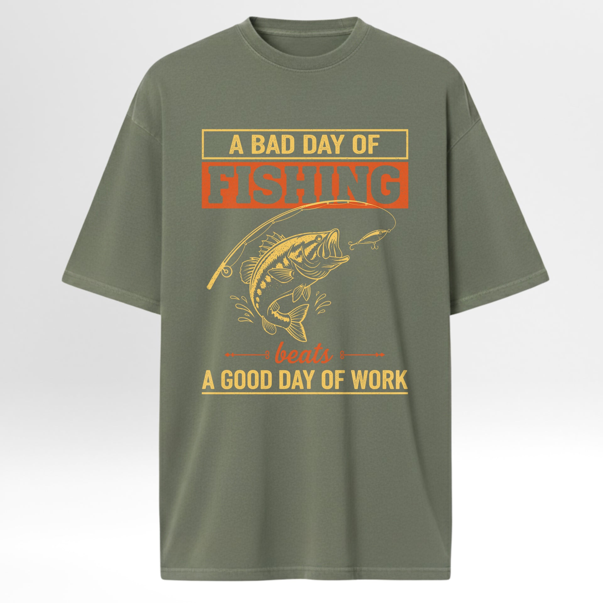 Green fishing t-shirt with fishing graphic and text 'A Bad Day Of Fishing Beats A Good Day Of Work'.