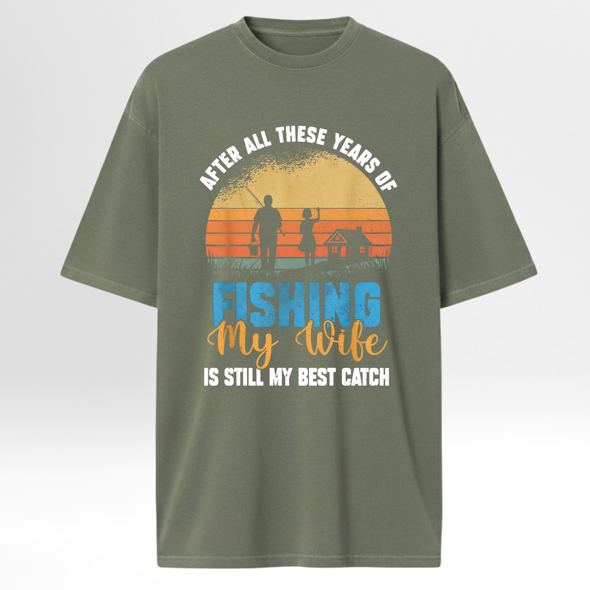 Green fishing t-shirt with fishing-themed graphic and text 'After All These Years Of Fishing My Wife Is Still My Best Catch'.