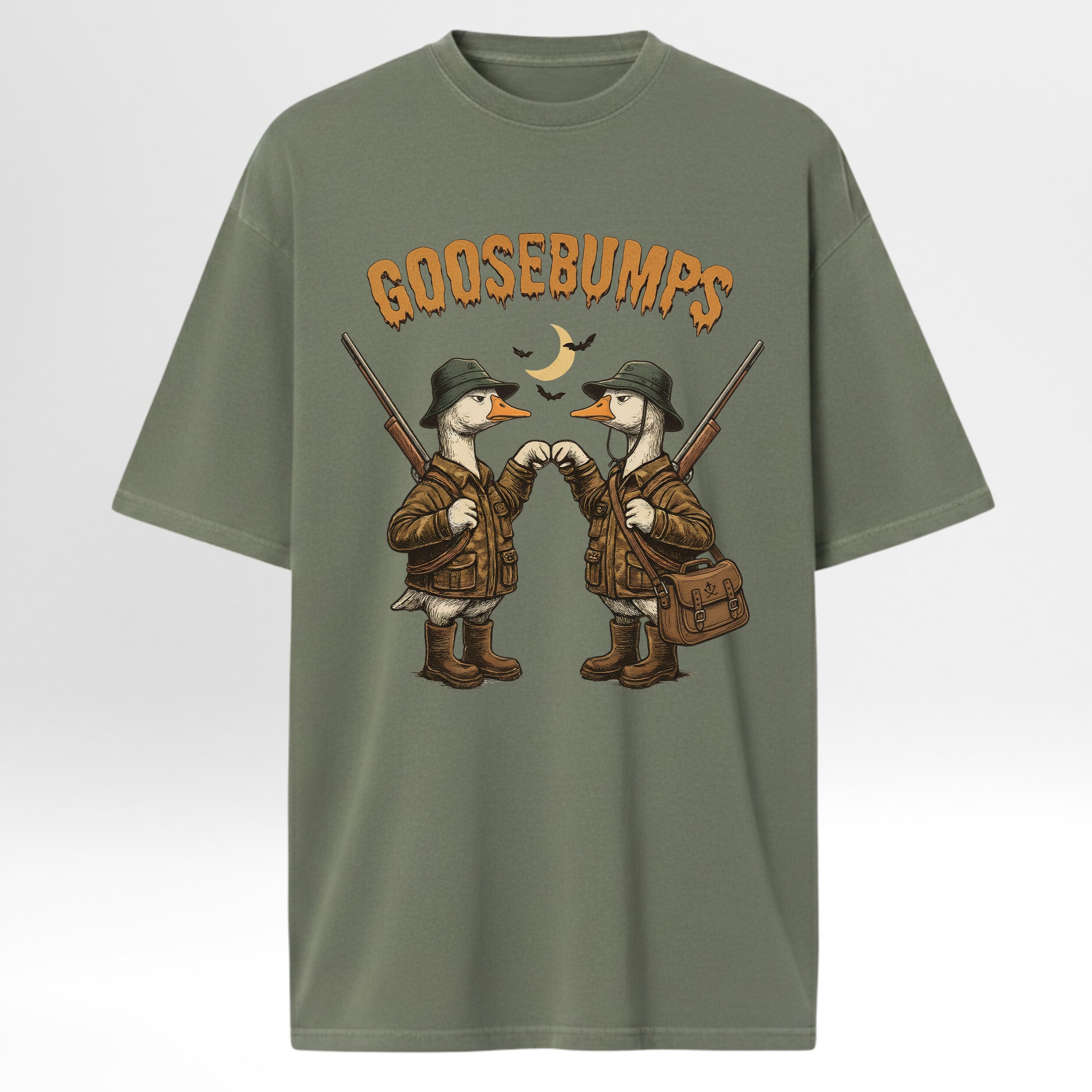 Green hunting graphic t-shirt with cartoon ducks in hunting gear and 'GOOSEBUMPS' text on a white background