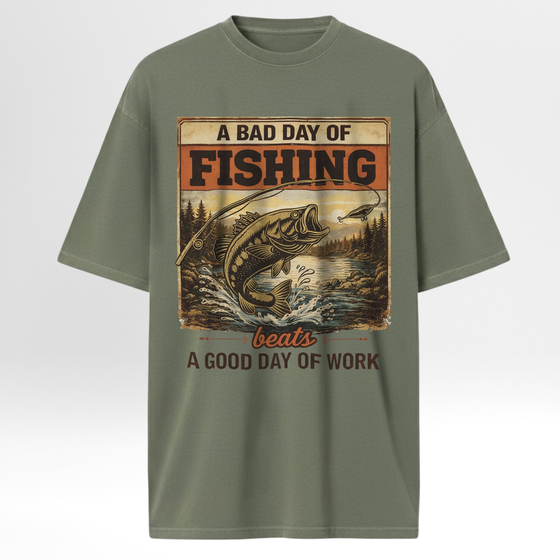 Green fishing t-shirt with fishing graphic and text 'A Bad Day Of Fishing Beats A Good Day Of Work'.