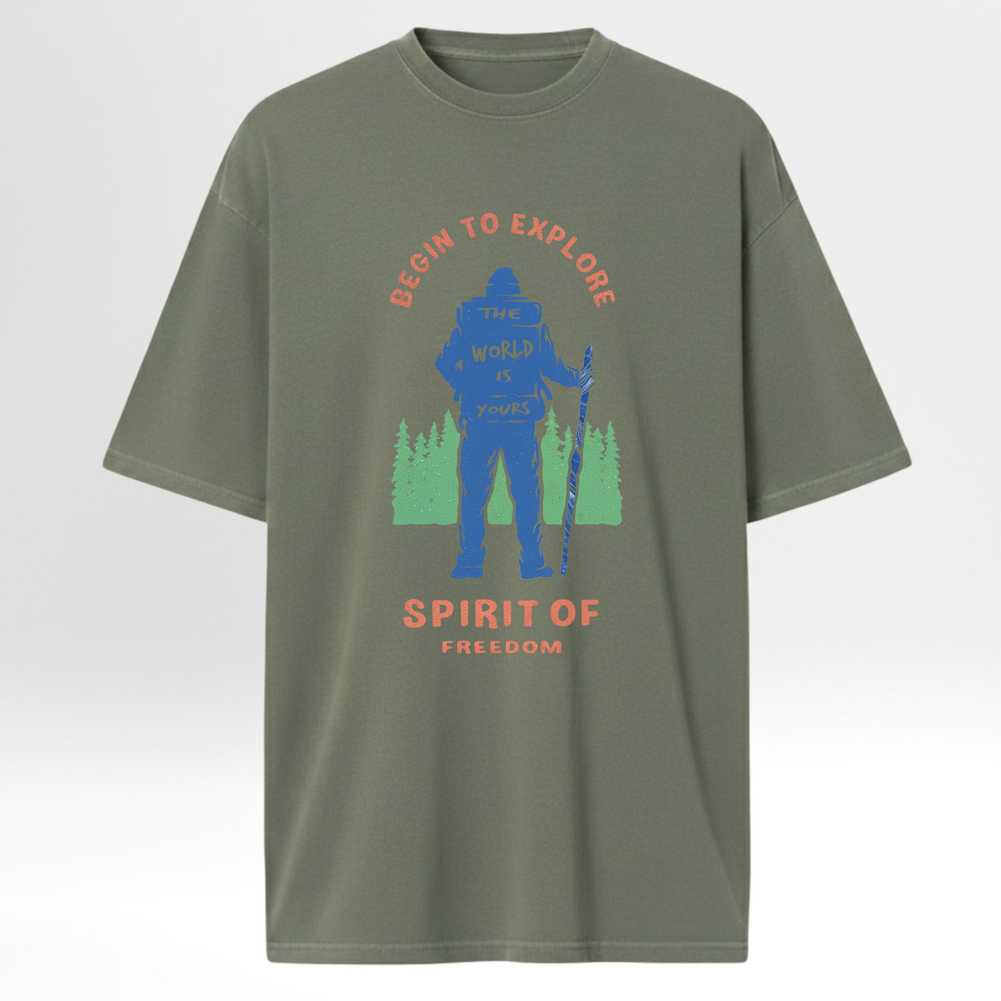 Green t-shirt with a graphic of a person hiking and text 'Begin to Explore the World is Yours Spirit of Freedom' 