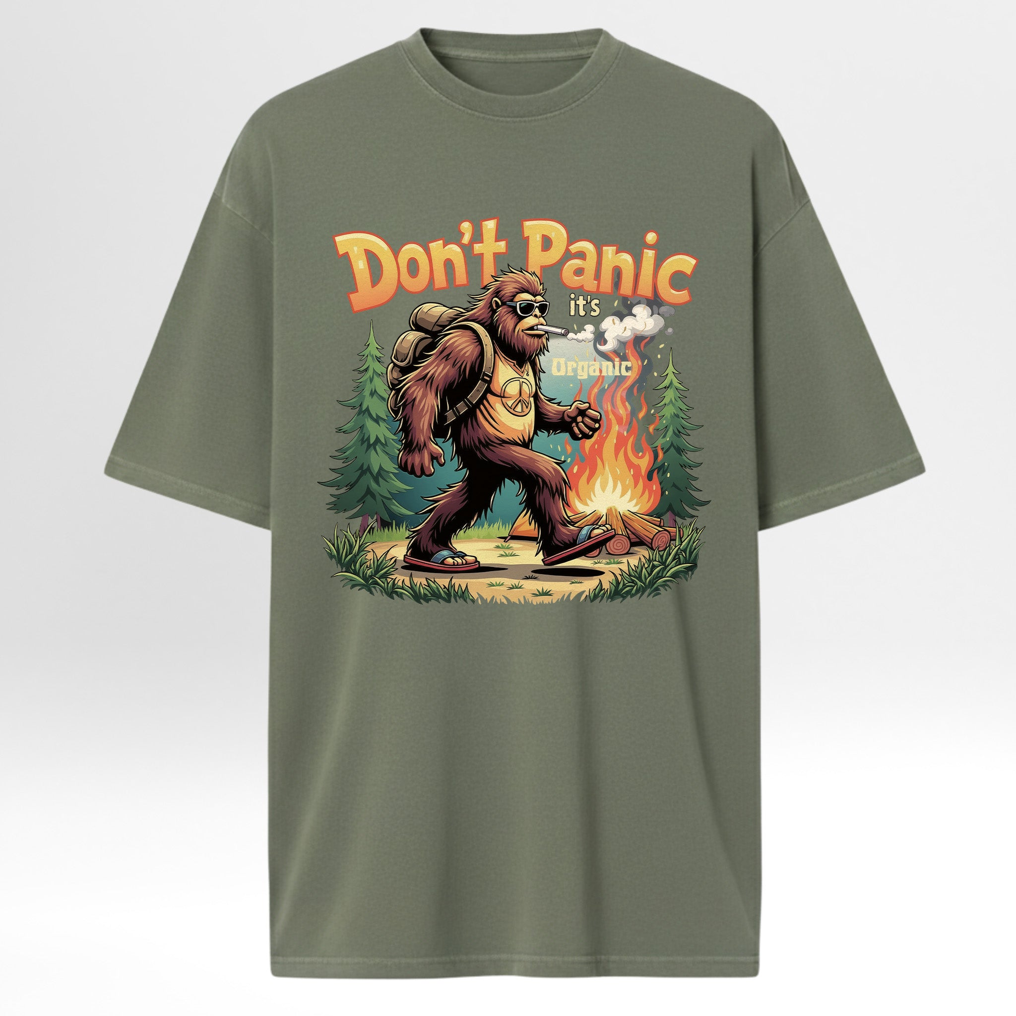 Green t-shirt with a graphic of a Ape by a campfire and 'Don't Panic it's organic' text 