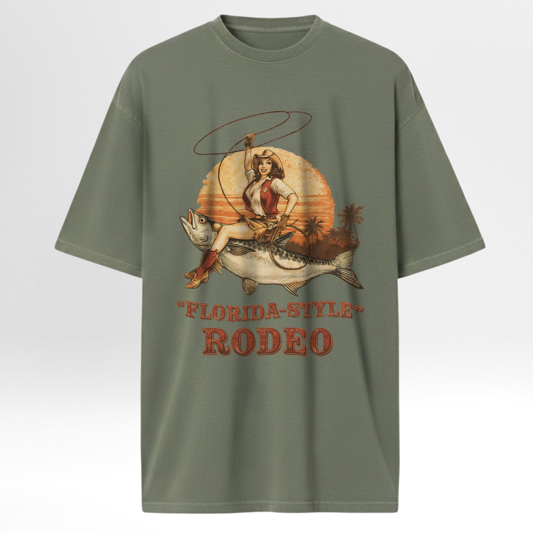 Green fishing t-shirt with a graphic design of a woman in a cowboy hat and boots, a fish, and 'Florida Style Rodeo' text.