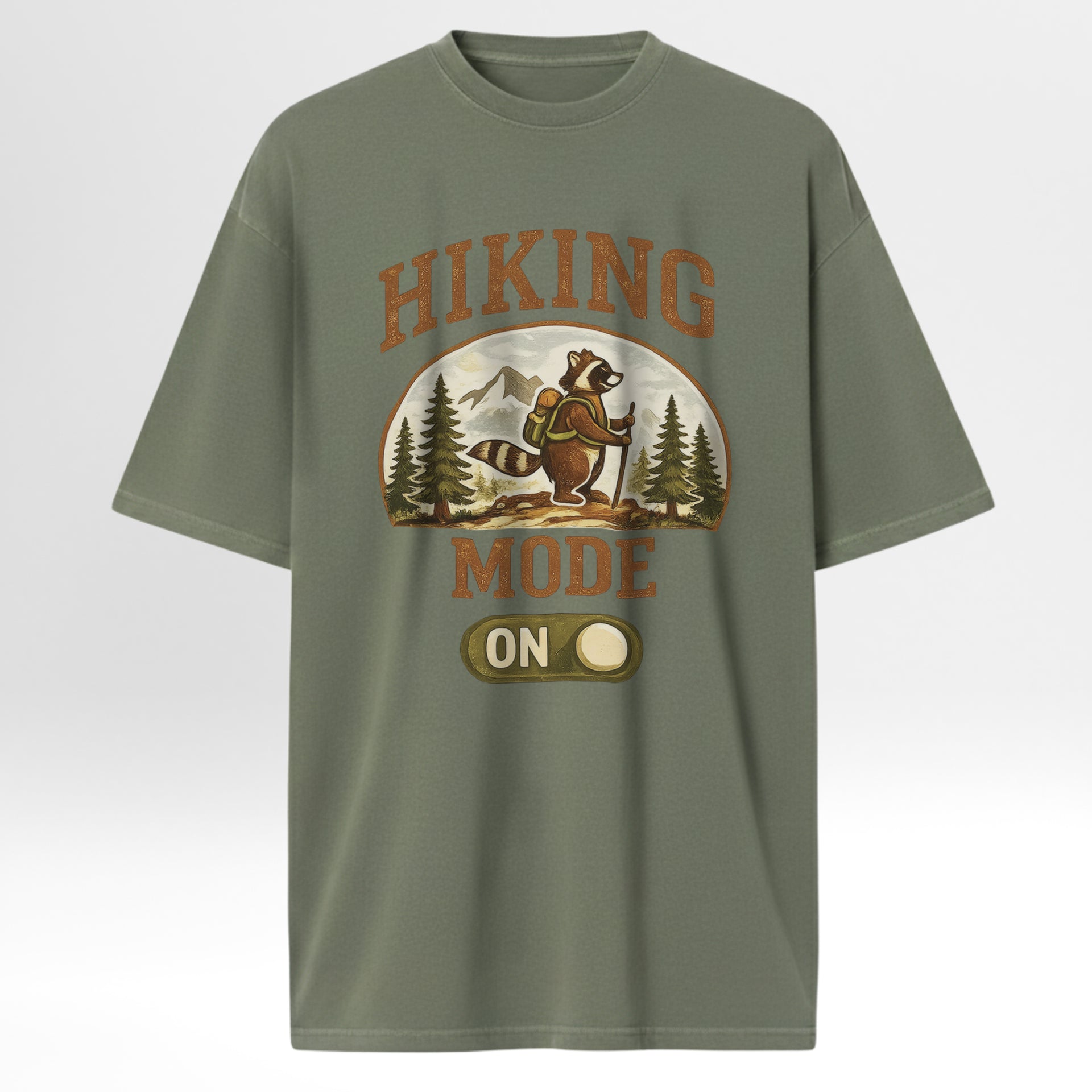Green t-shirt with a raccoon graphic and 'Hiking Mode On' text 