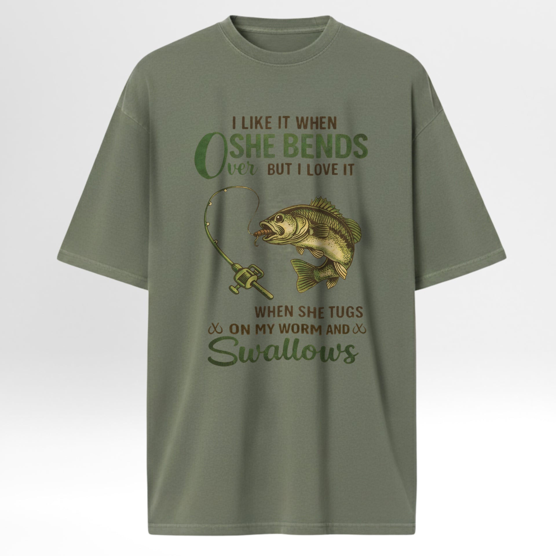 Green fishing t-shirt with fishing graphic and humorous text 'I Like It When She Bends Over But I Love It When She Tugs On My Worm And Swallows'