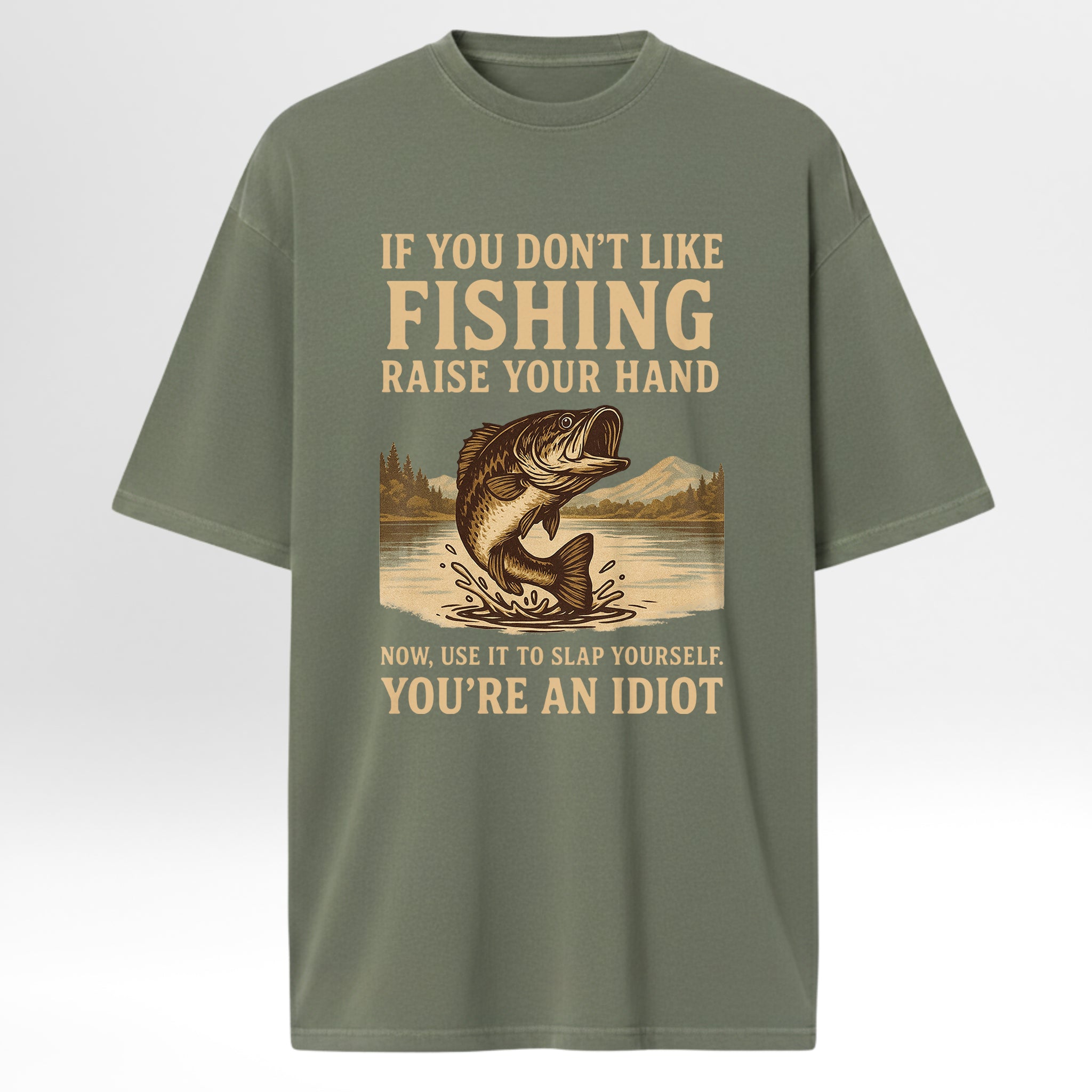 Green t-shirt with fishing graphic and humorous 'If You Don't Like Fishing Raise Your Hand Now Use It To Slap Yourself You're An Idiot'