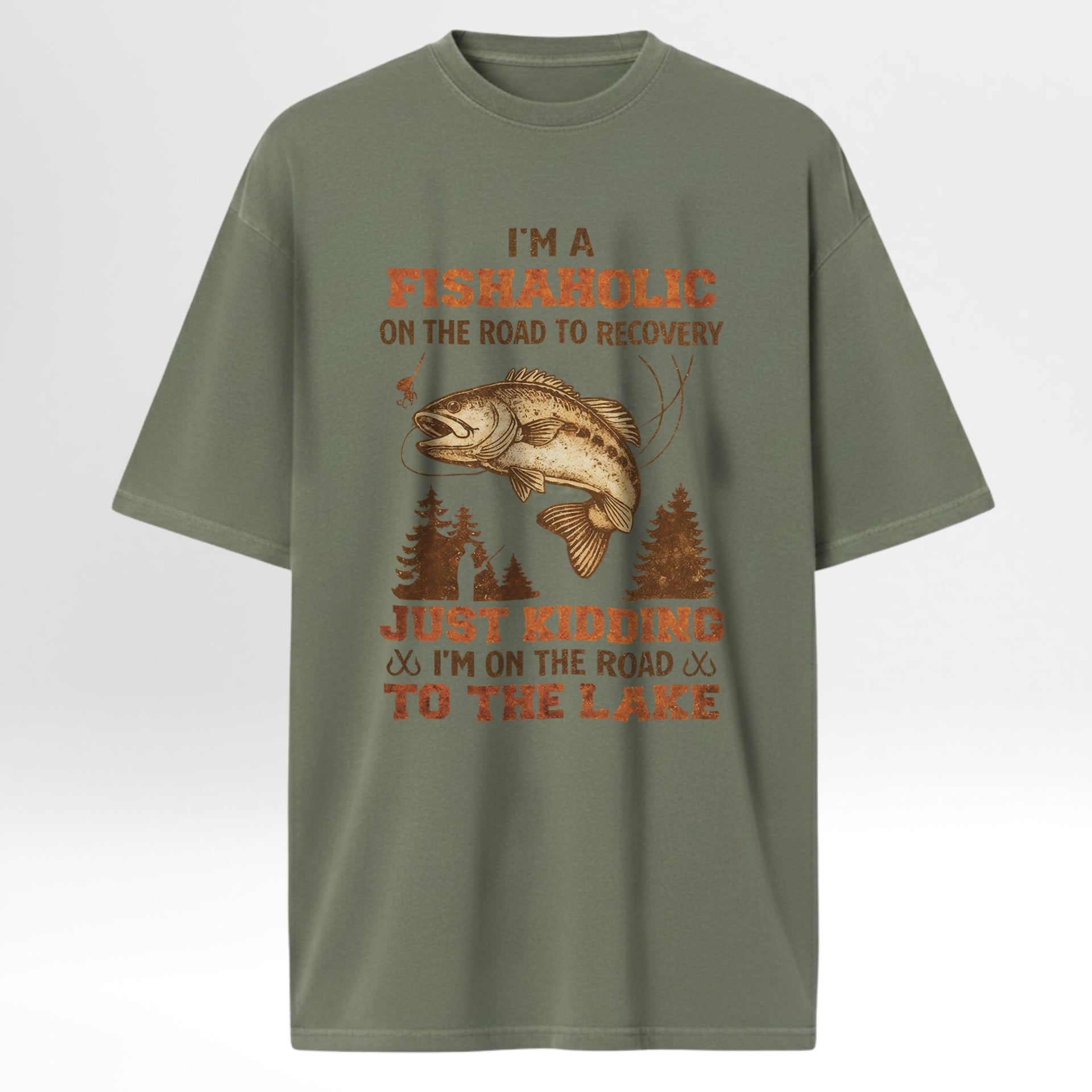 Green fishing t-shirt with fishing graphic and humorous text 'I'm A Fishaholic On The Road To Recovery Just Kidding I'm On The Road To The Lake'