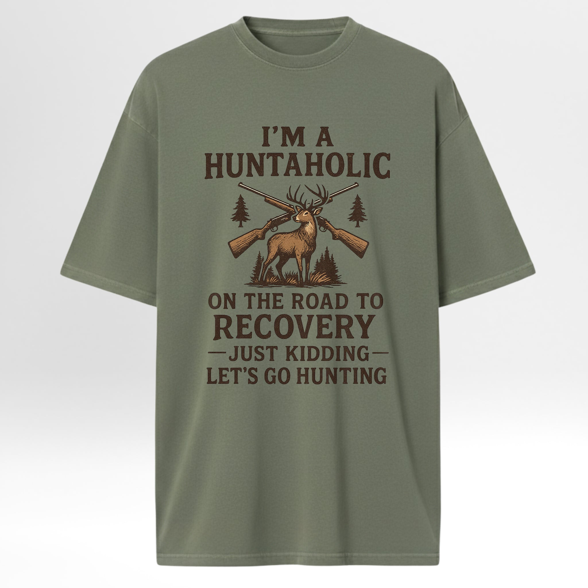 Green t-shirt with hunting-themed graphic and text 'I'm A Huntaholic On The Road To Recovery Just Kidding Let's Go Hunting'