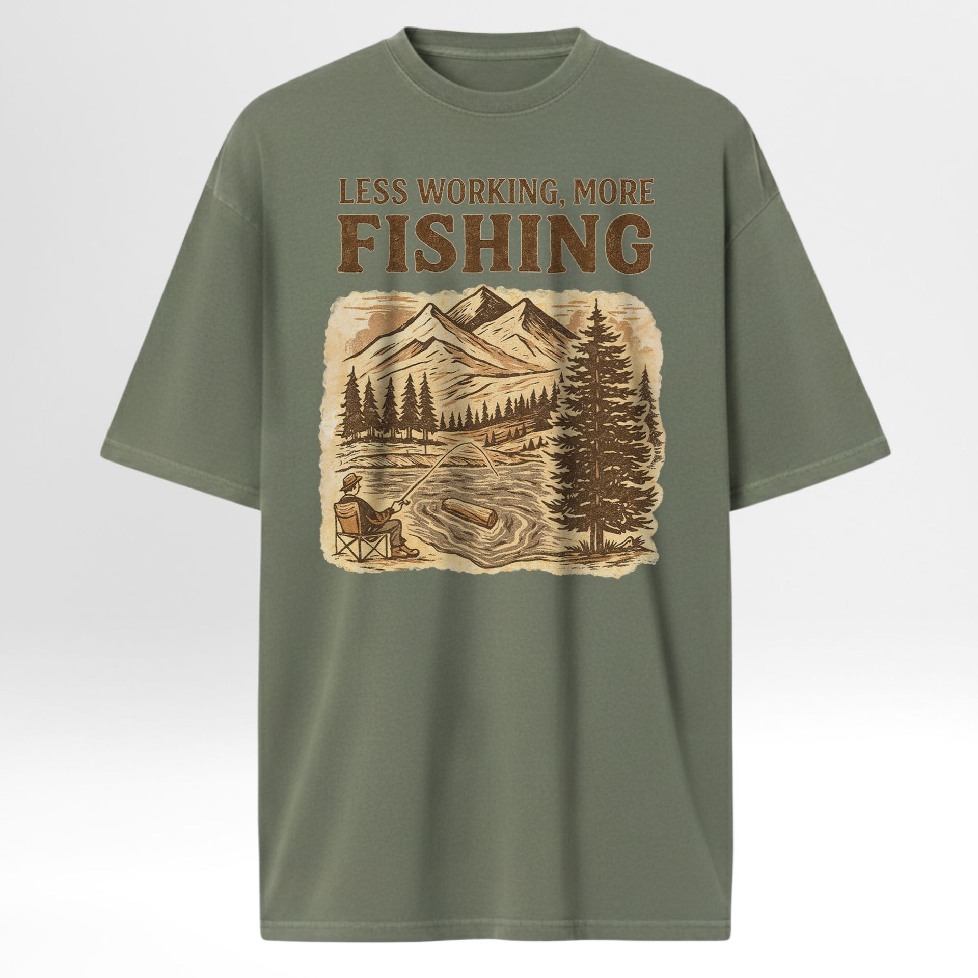 Green fishing t-shirt with fishing graphic and text 'LESS WORKING. MORE FISHING'.
