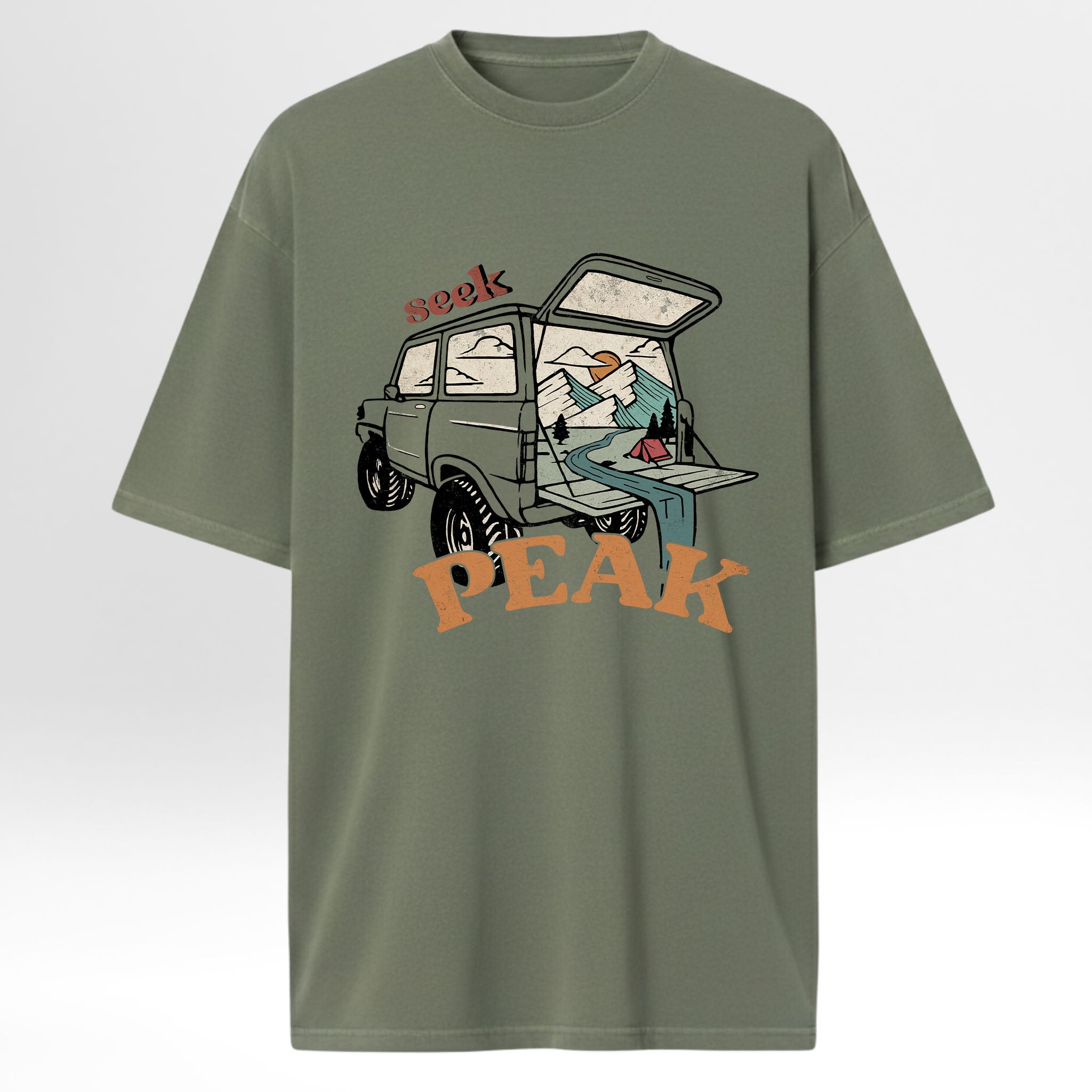 Green t-shirt with graphic design of a car and text 'Seek Peak'