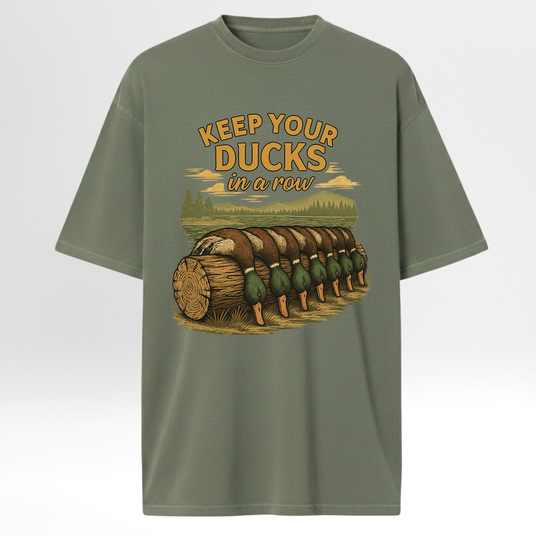 Green hunting t-shirt with duck graphic and text 'Keep your ducks in a row' 