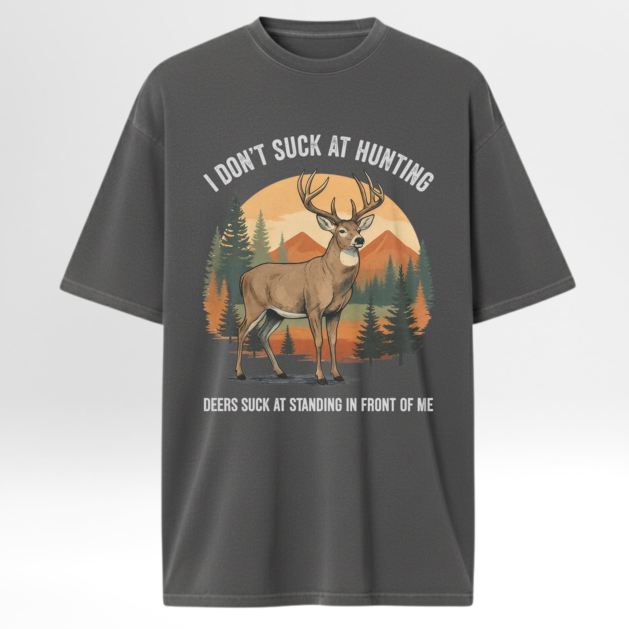 Gray hunting t-shirt with a graphic of a deer and text 'I Don't Suck At Hunting Deers Suck At Standing In Front Of Me'.
