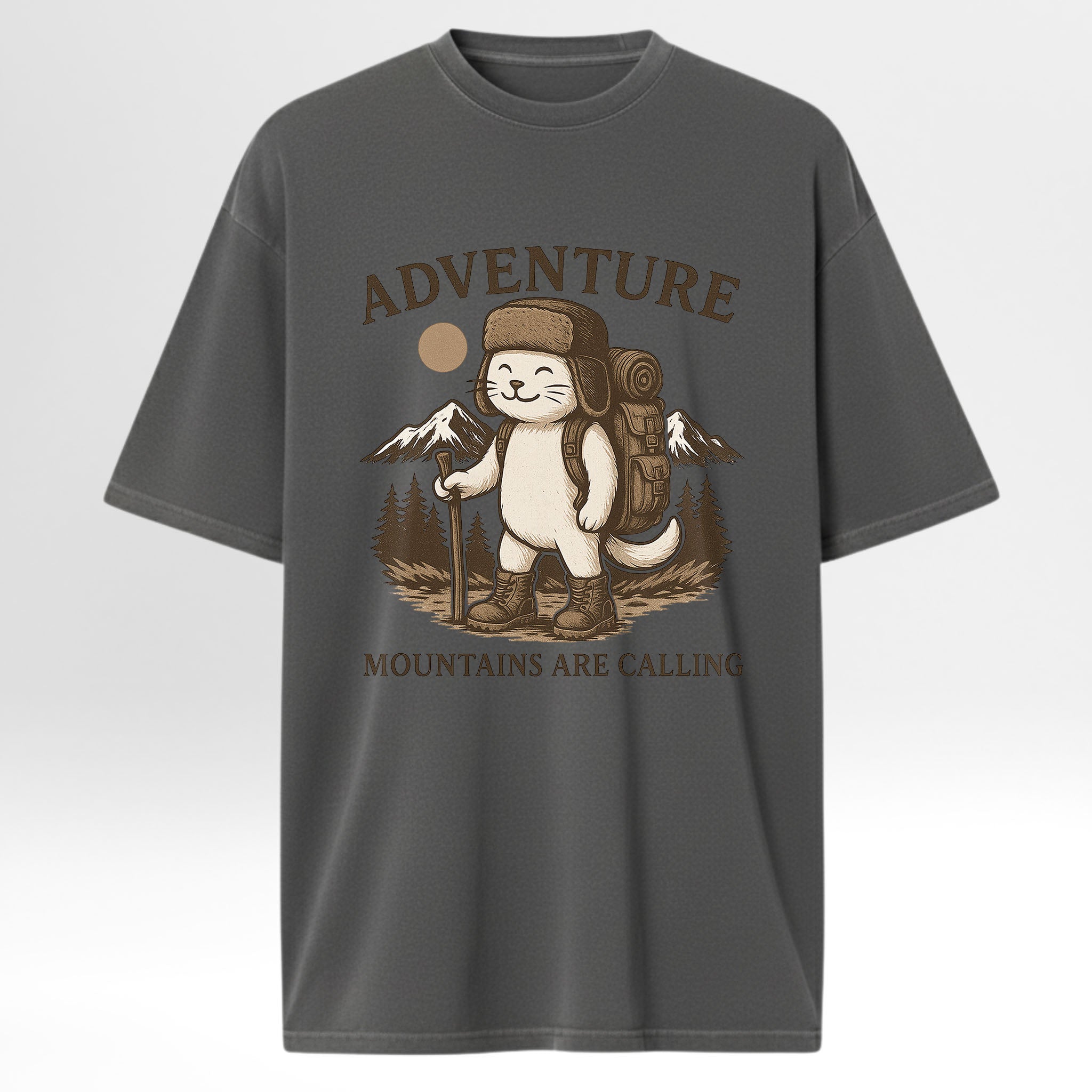 Gray trail graphic t-shirt with a graphic of a cat in a hat and backpack with 'Adventure Mountains Are Calling' text.
