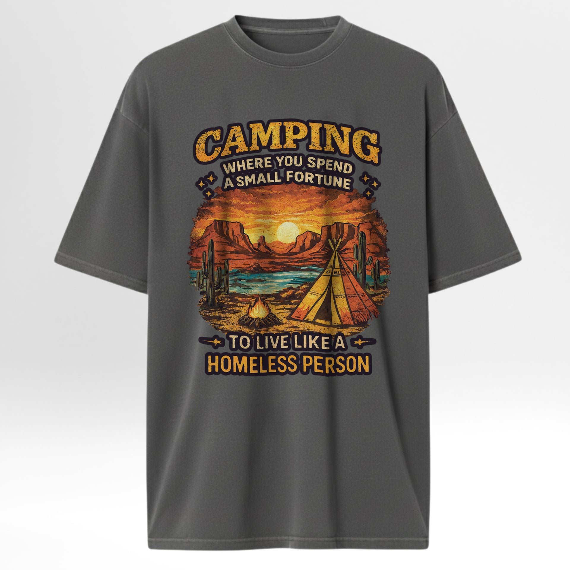 Gray camping t-shirt with camping graphic and text 'Camping Where You Spend A Small Fortune To Live Like A Homeless Person'.